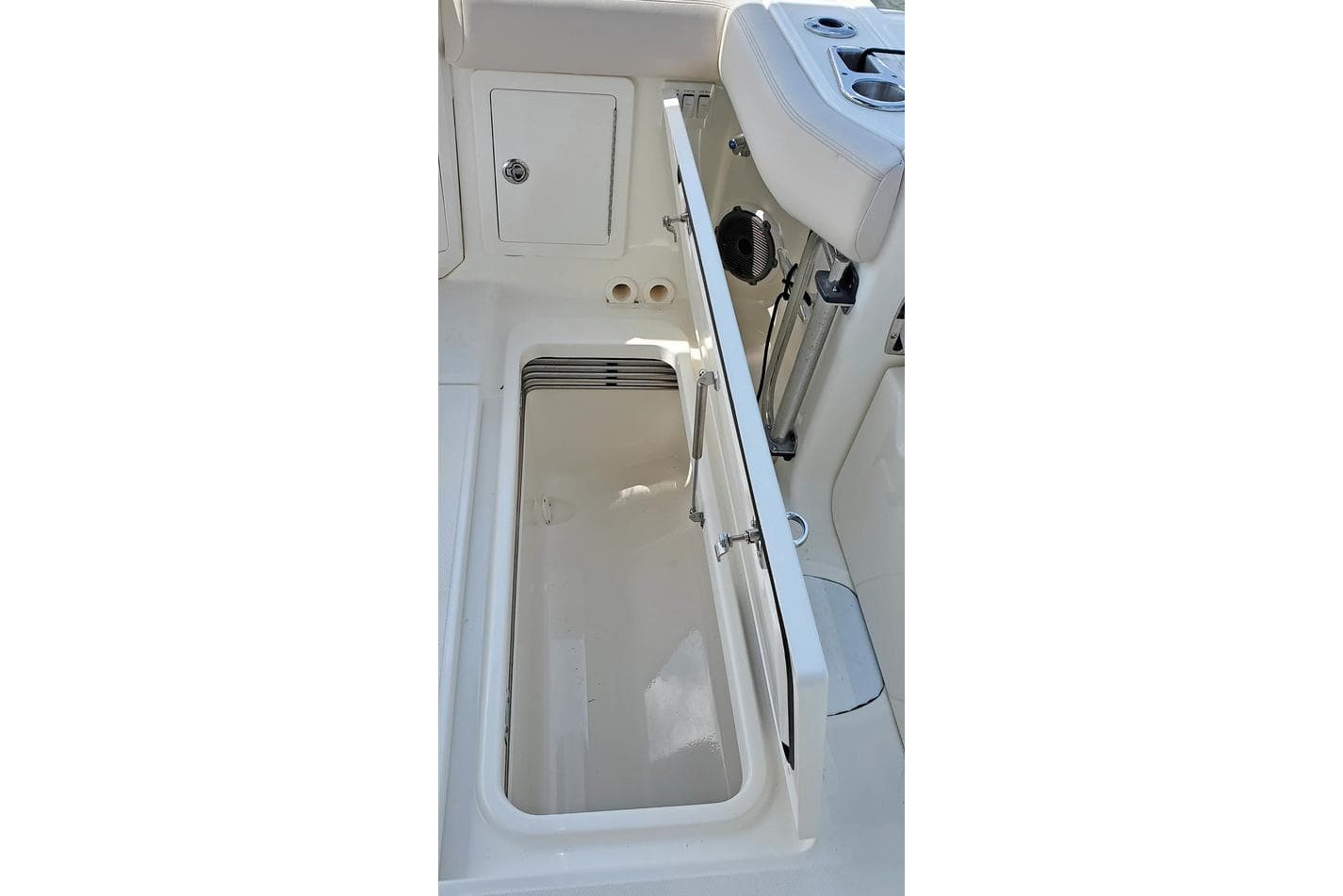 Manufacturer Provided Image: Boston Whaler 405 Conquest 2026 boat storage compartment with open lid.