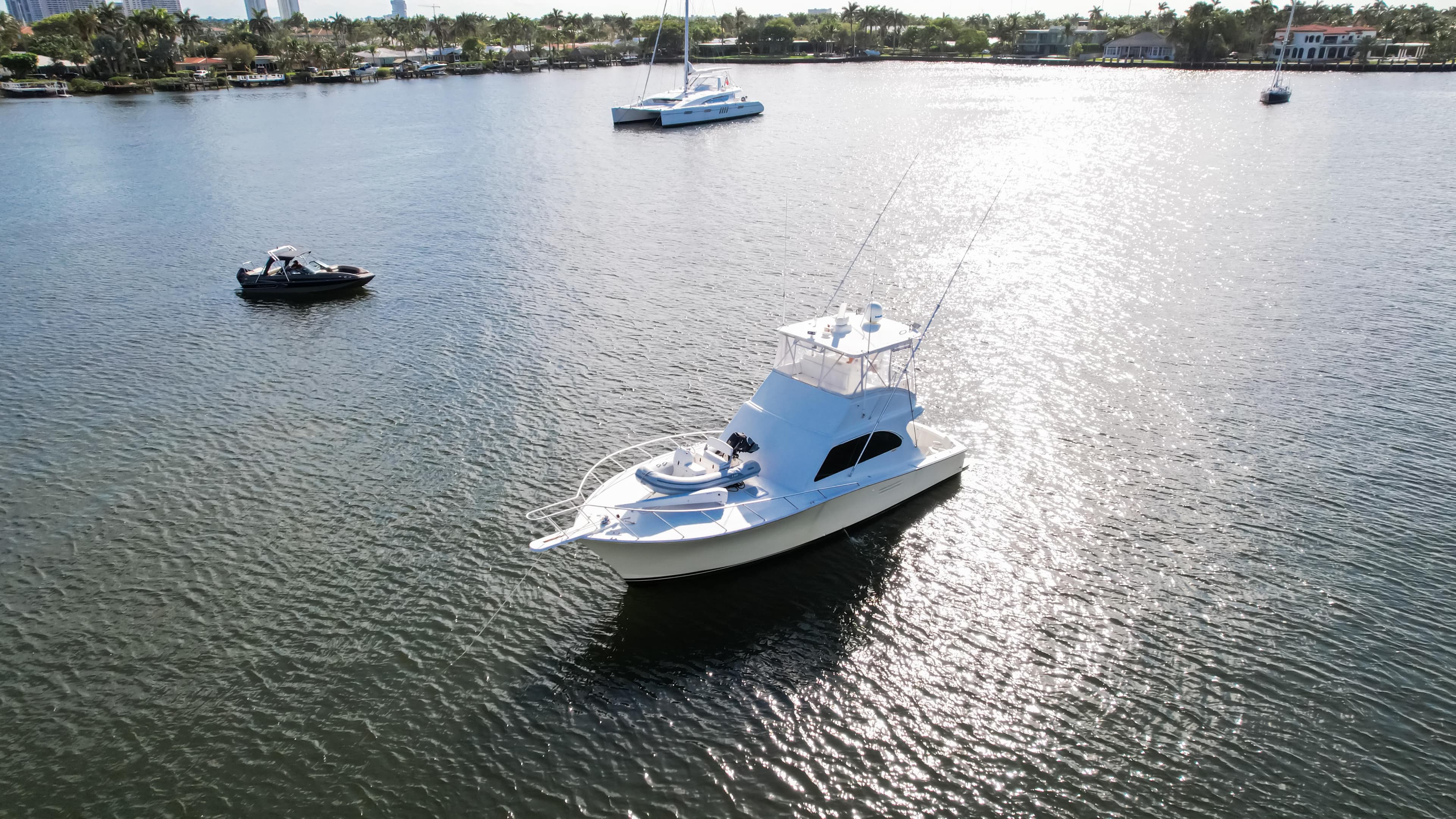 Aerial view of 2008 Post 42 yacht on calm water with other boats nearby.