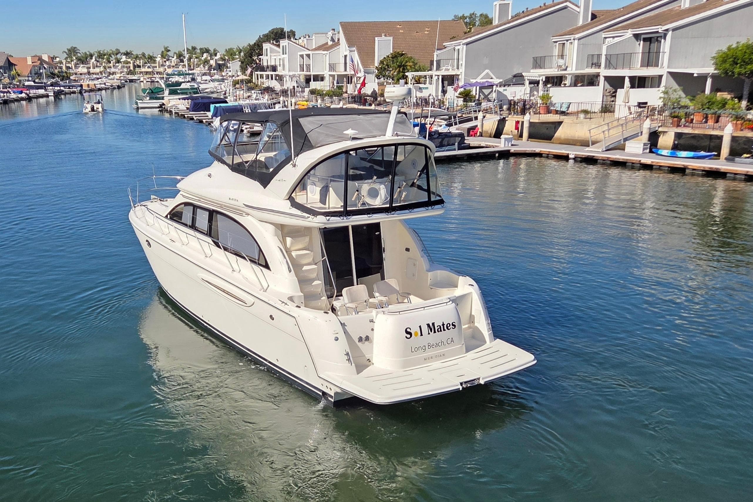 2005 Meridian 411 Sedan yacht docked in a marina, Long Beach, CA.