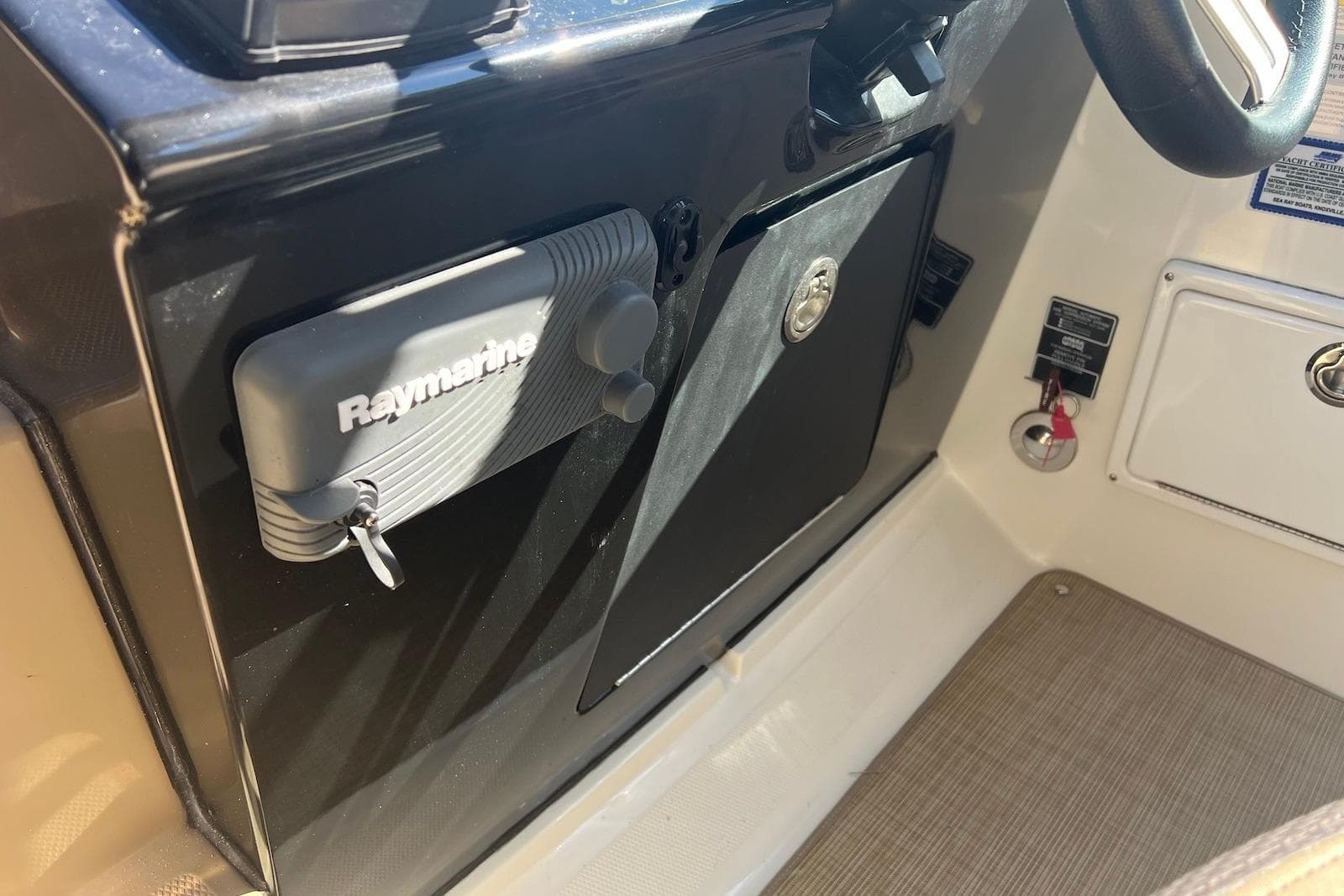 Control panel of a 2018 Sea Ray Sundancer 280 with Raymarine equipment.