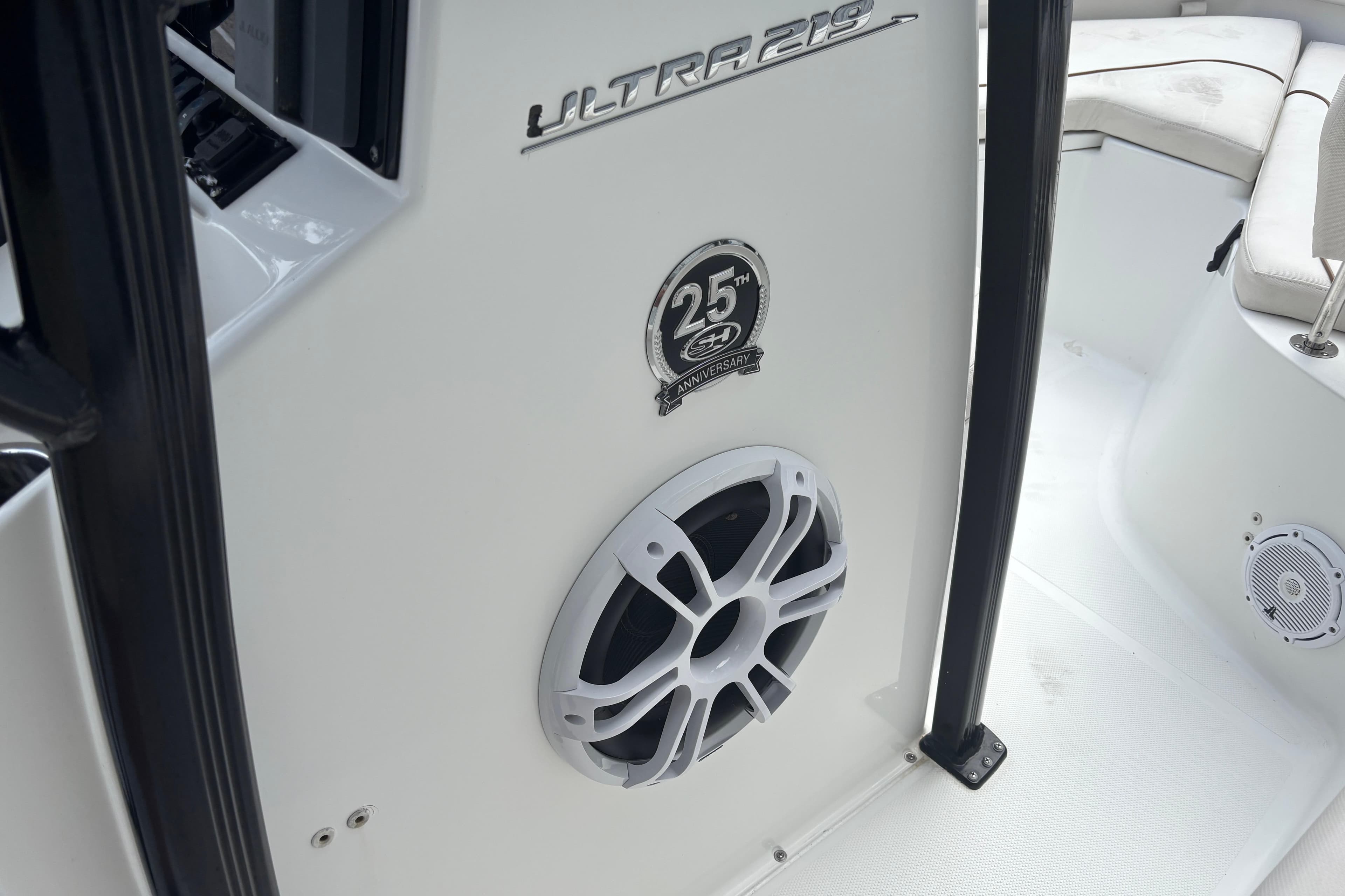 2021 Sea Hunt Ultra 219 boat interior with speaker and 25th anniversary badge.