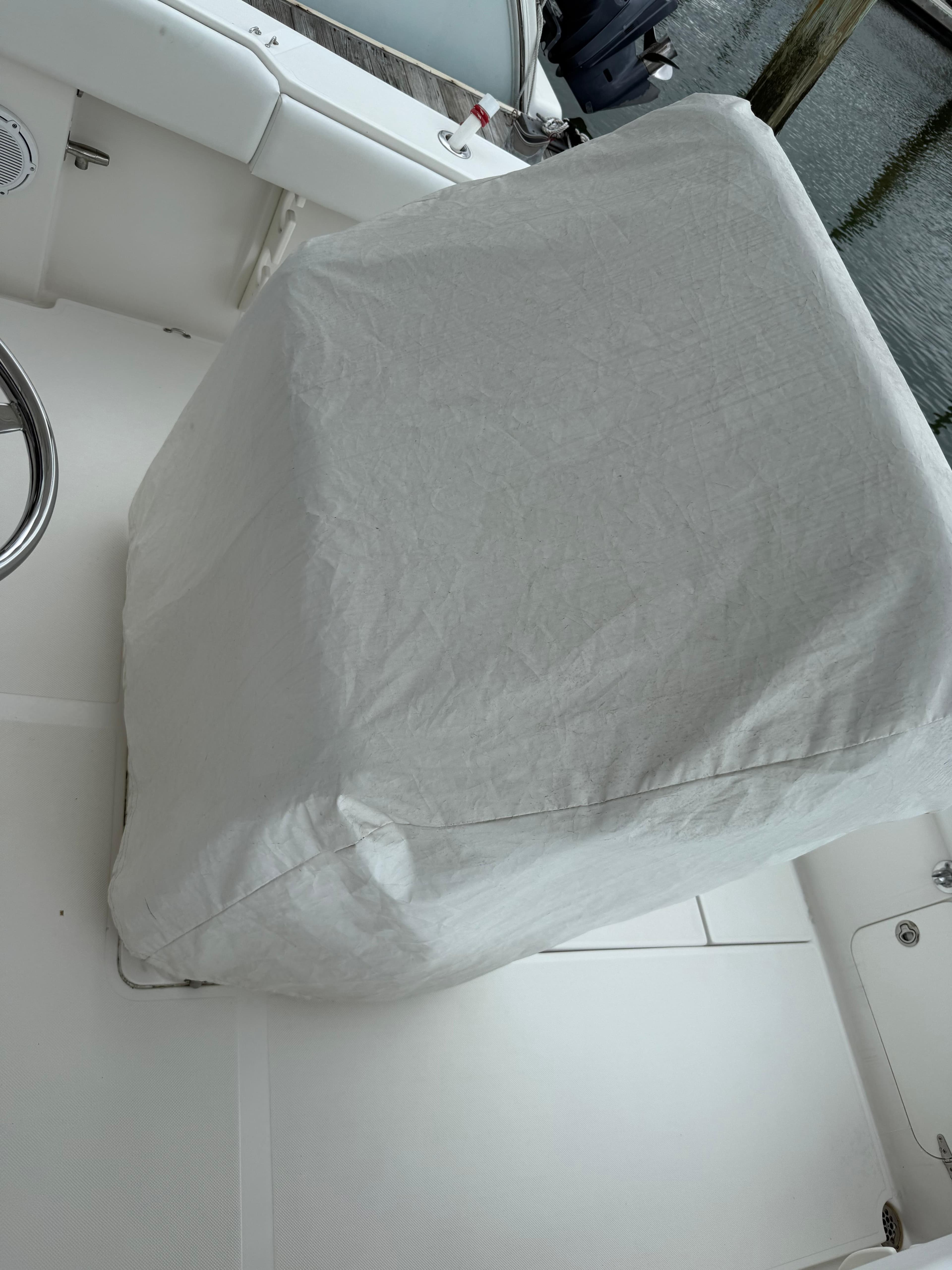 Covered console on a 2012 Jupiter 26 boat deck.