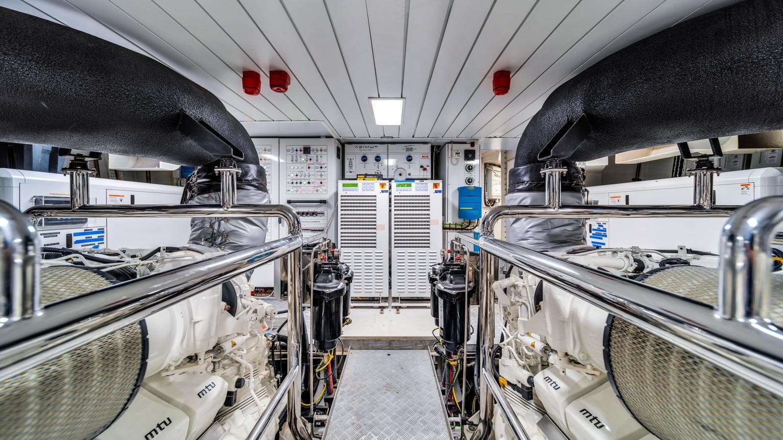 Engine room of 2020 Azimut Grande 32 Metri yacht, featuring MTU engines and advanced equipment.