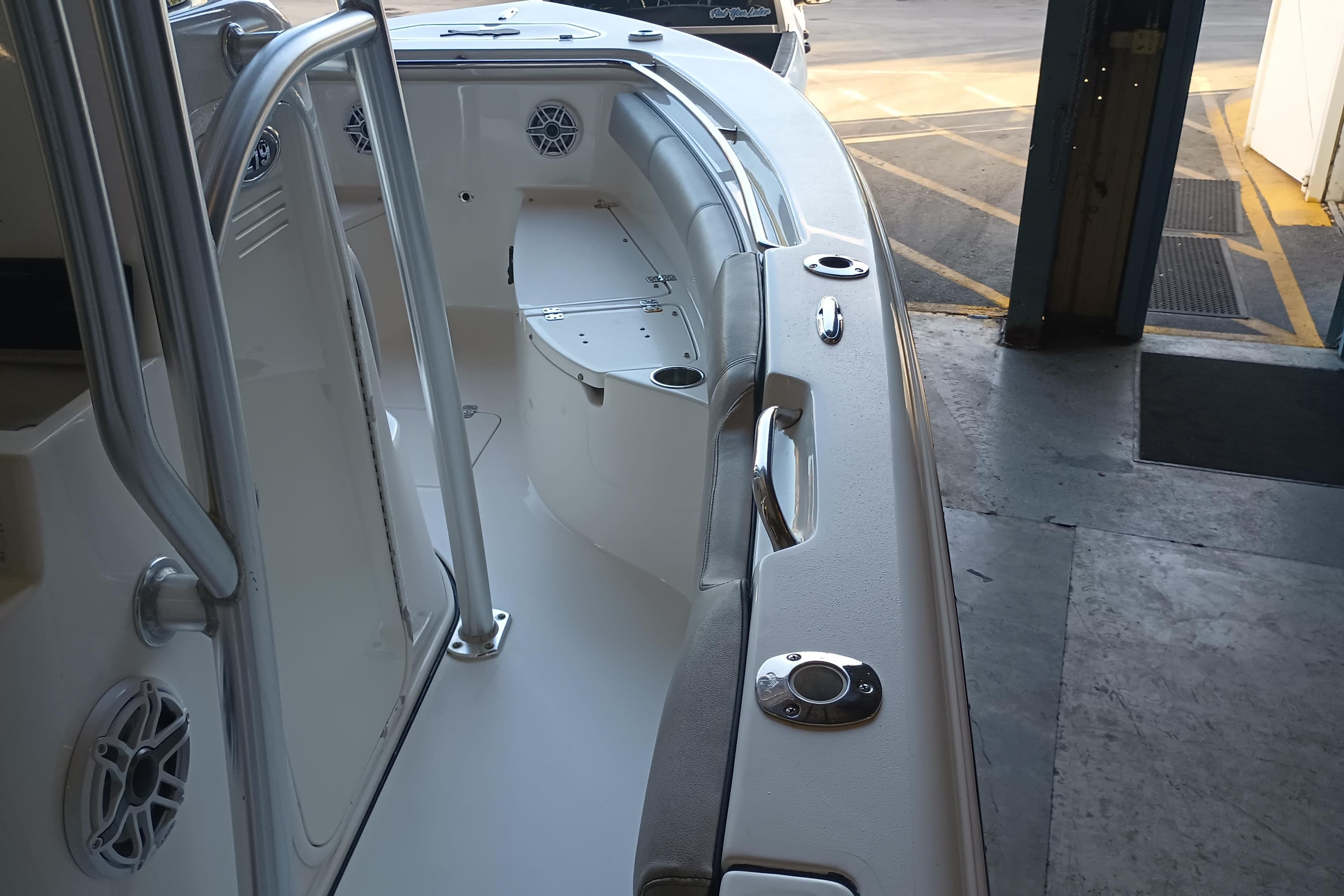 2017 Seapro 219 boat interior with seating and stainless steel railings.