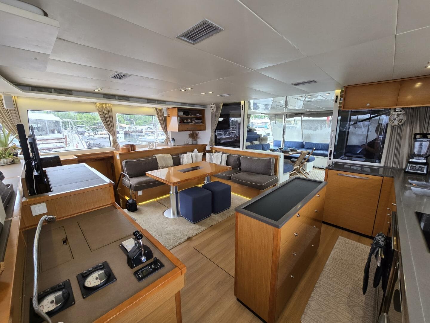 Luxurious interior of 2016 Lagoon 560 S2 catamaran with modern furnishings and ample natural light.