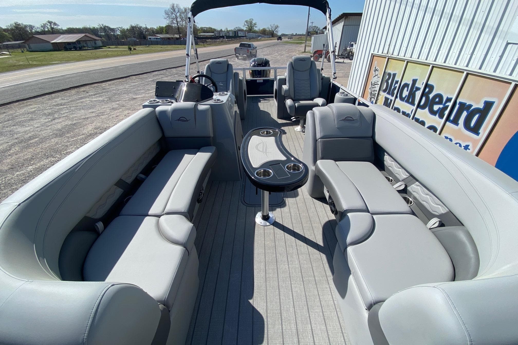 2026 SunCatcher Fusion 322SS pontoon boat with spacious seating and modern design.