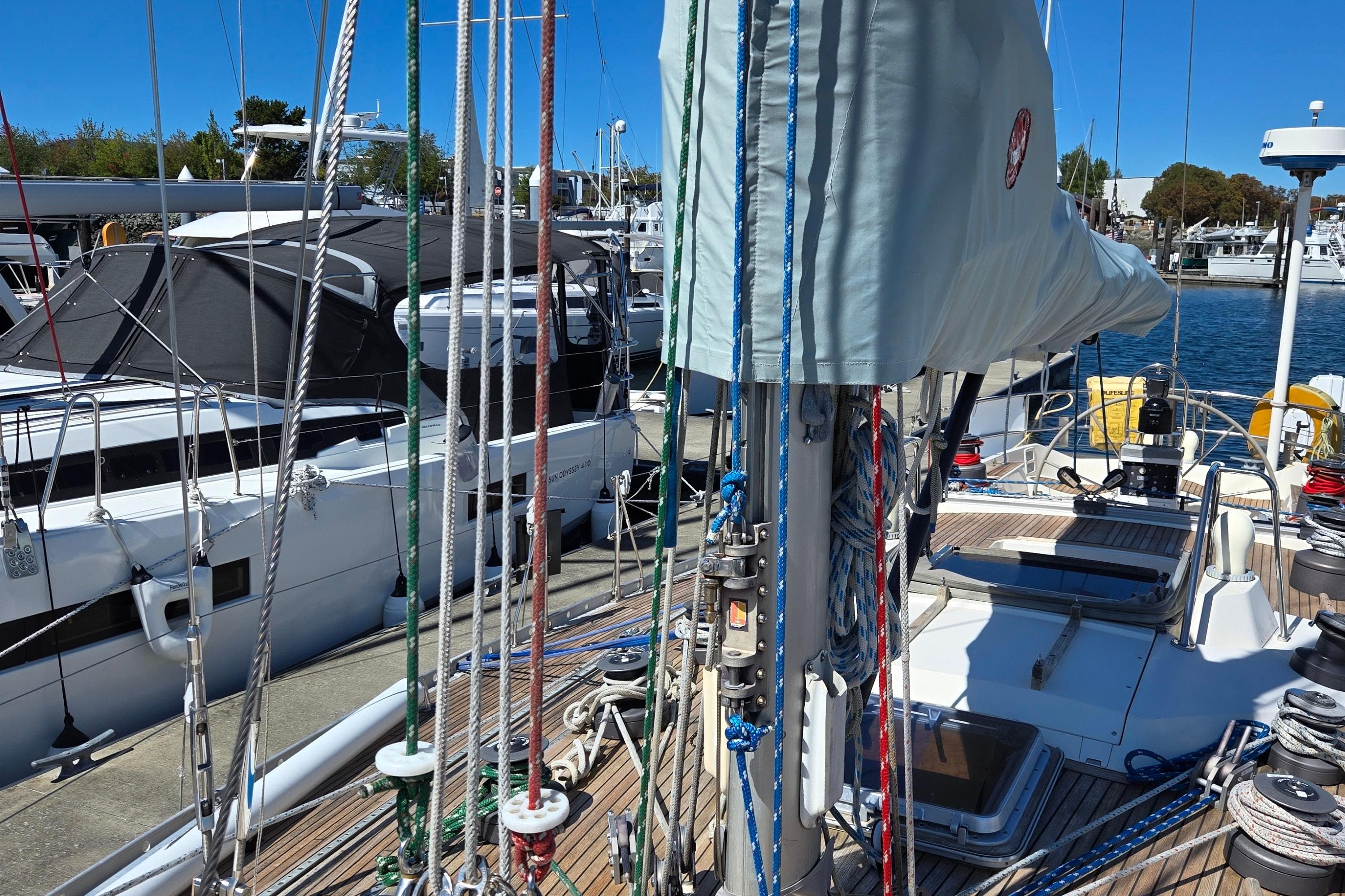 Swan 46 sailboat from 1985 docked, showcasing rigging and deck details.