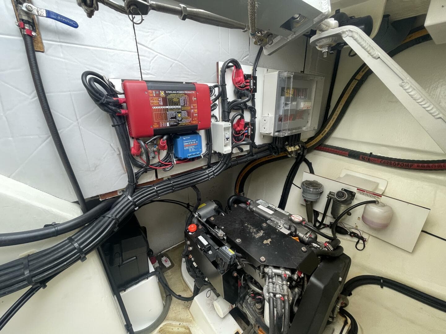 Engine room of a 2019 Leopard 50 yacht, showcasing electrical systems and wiring.