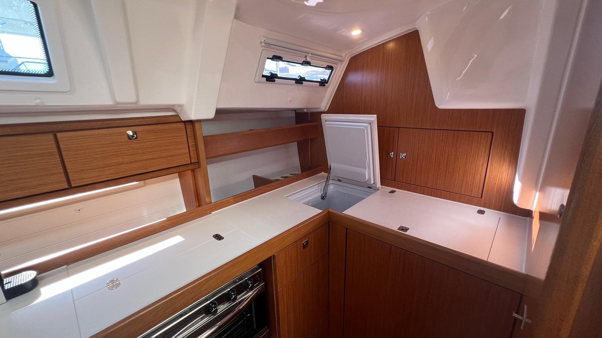 Interior of Bavaria Cruiser 41 yacht, 2022 model, featuring modern kitchen.