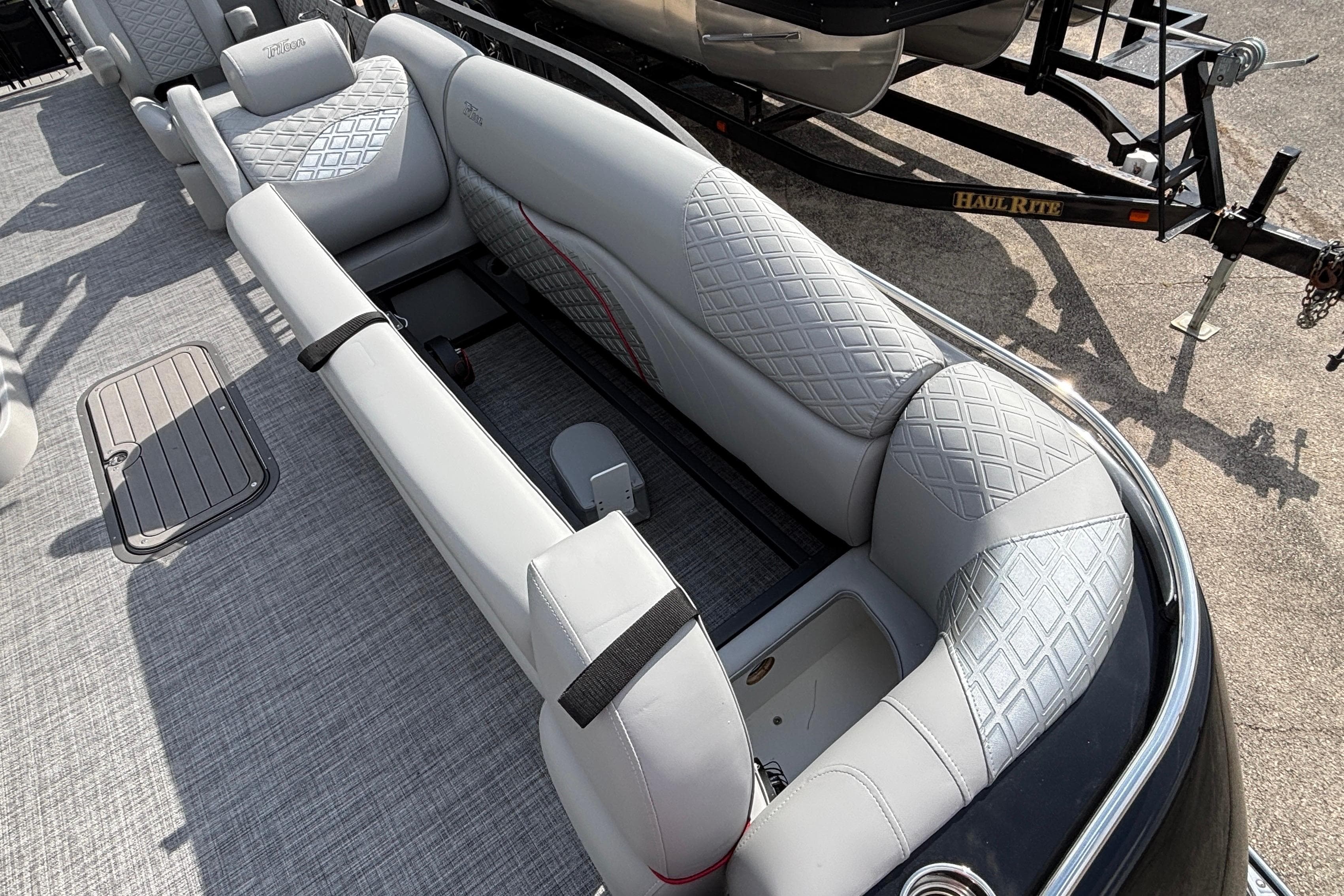 Luxurious seating on 2026 JC Sporttoon 26TT pontoon boat with diamond-pattern upholstery.