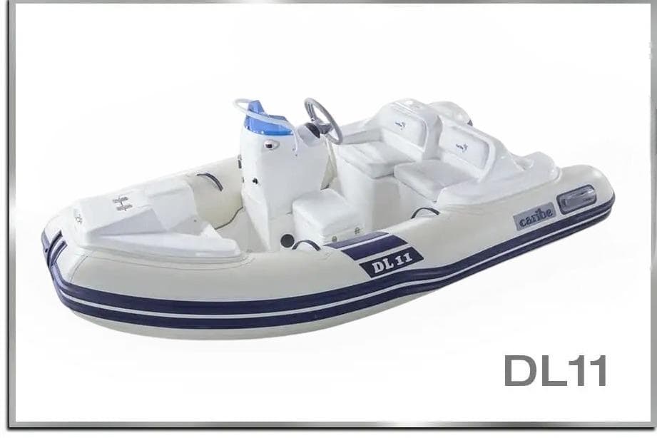 2025 Caribe DL11 inflatable boat with white and blue design, featuring seating and steering console.