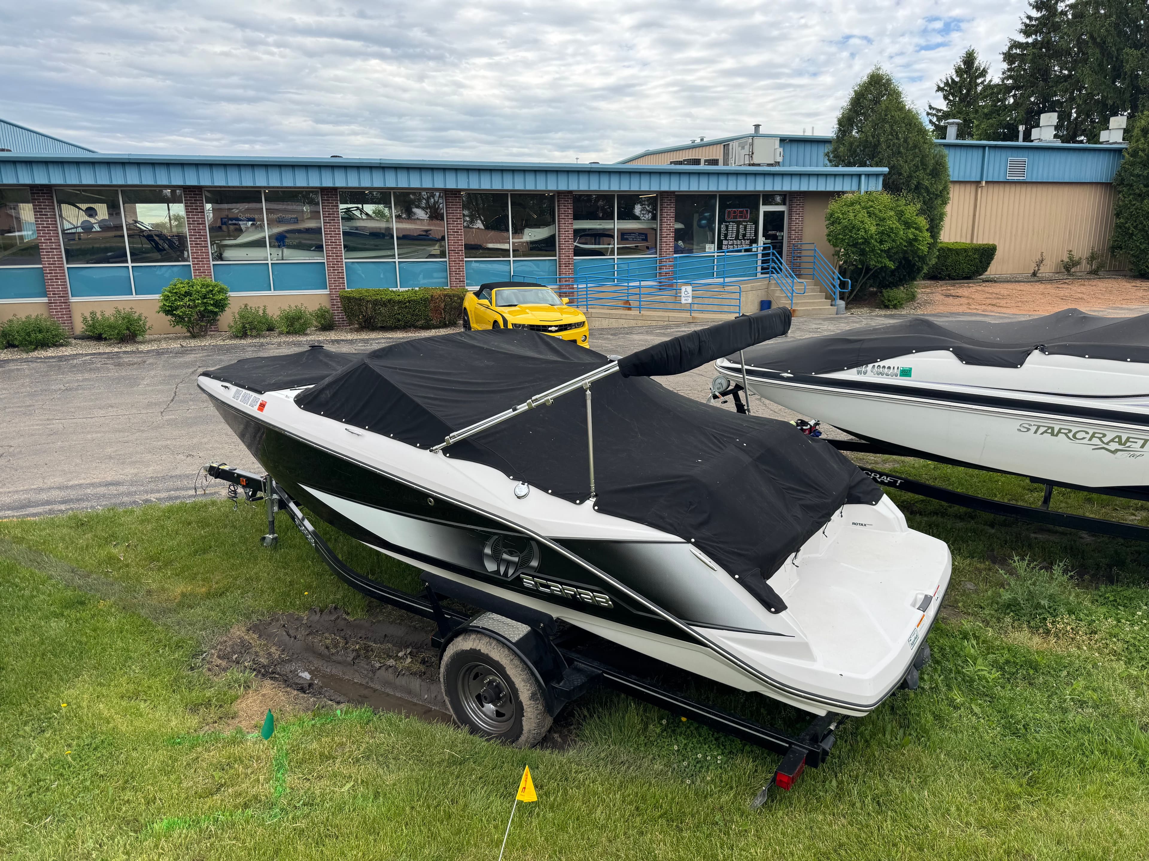 2017 Scarab SB 195 JET boat with cover on trailer.