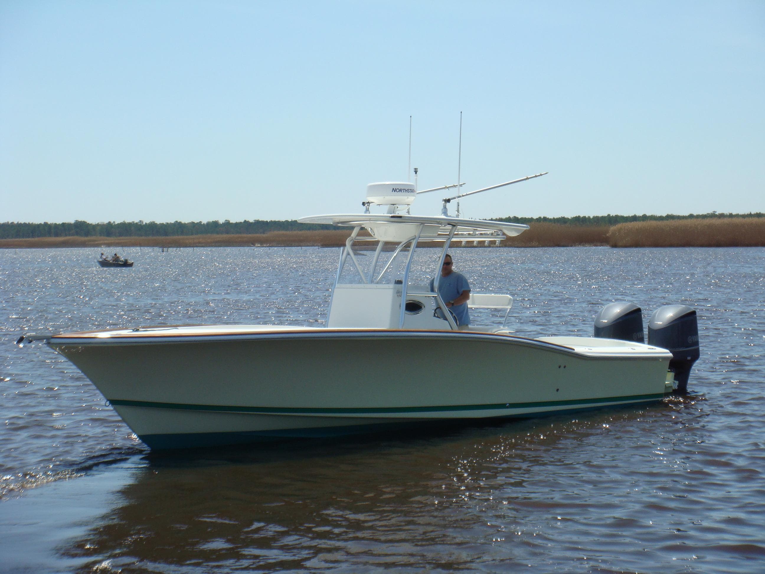 2024 Jersey Cape 31 Little Devil boat on water.
