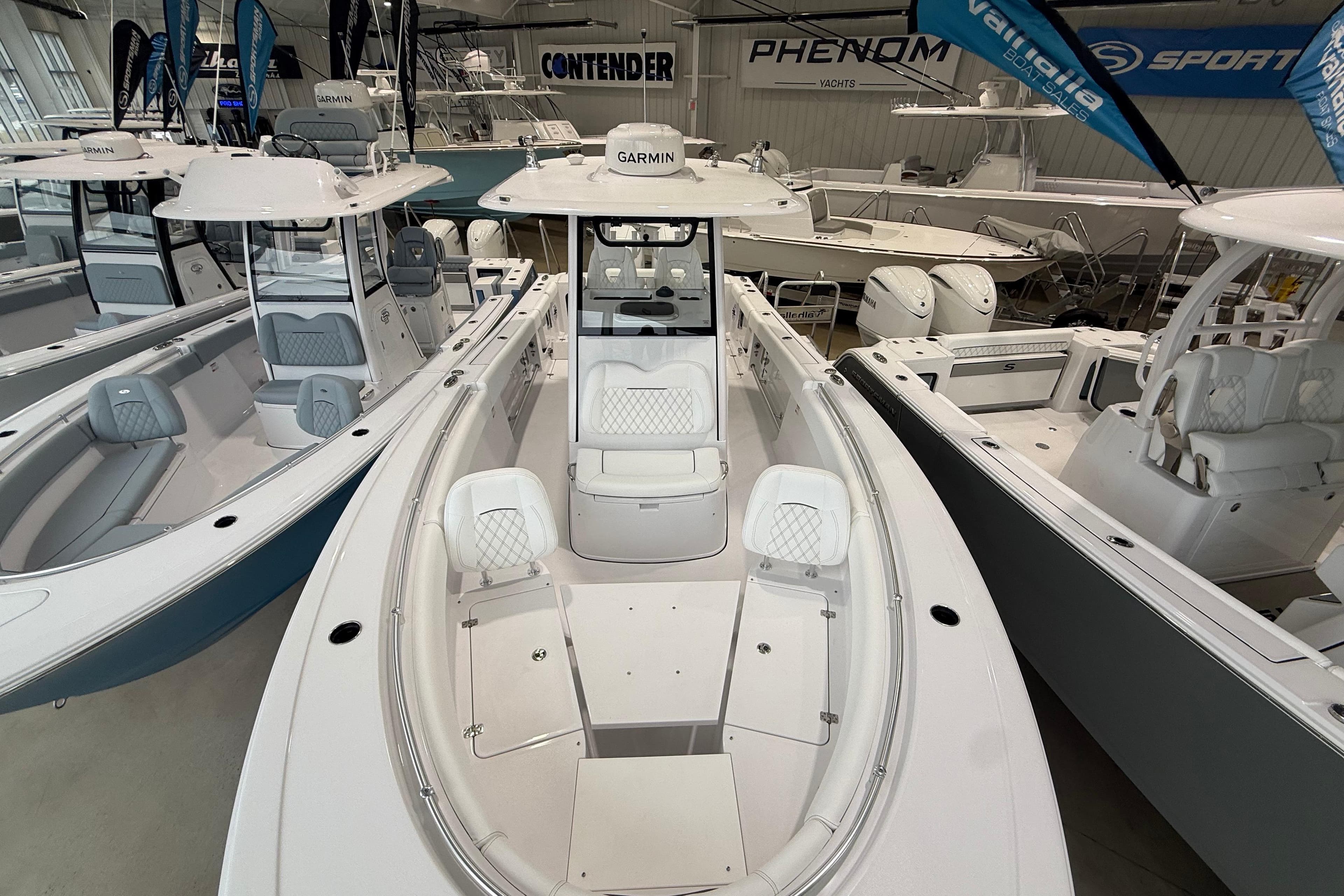 2026 Sportsman Open 282 Center Console boat displayed in a showroom.