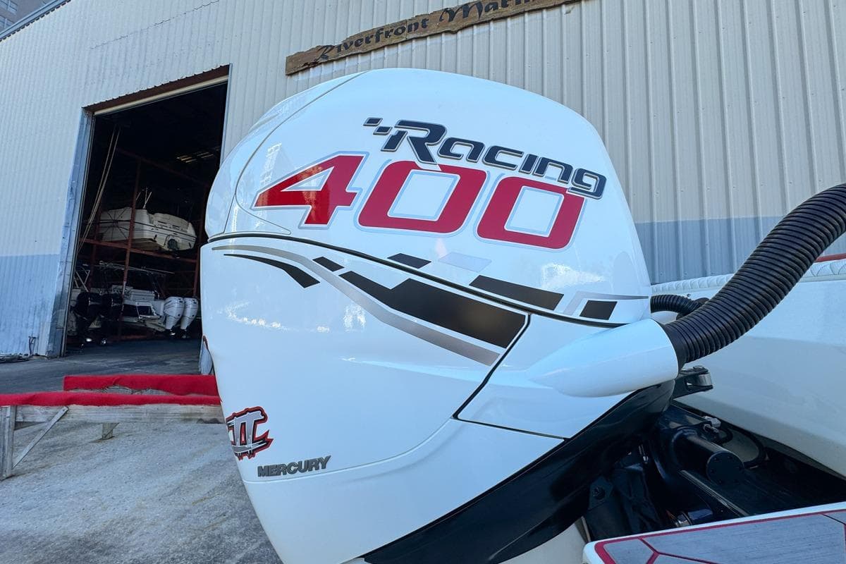 Mercury Racing 400 outboard engine on 2022 Velocity 290sc boat at marina.