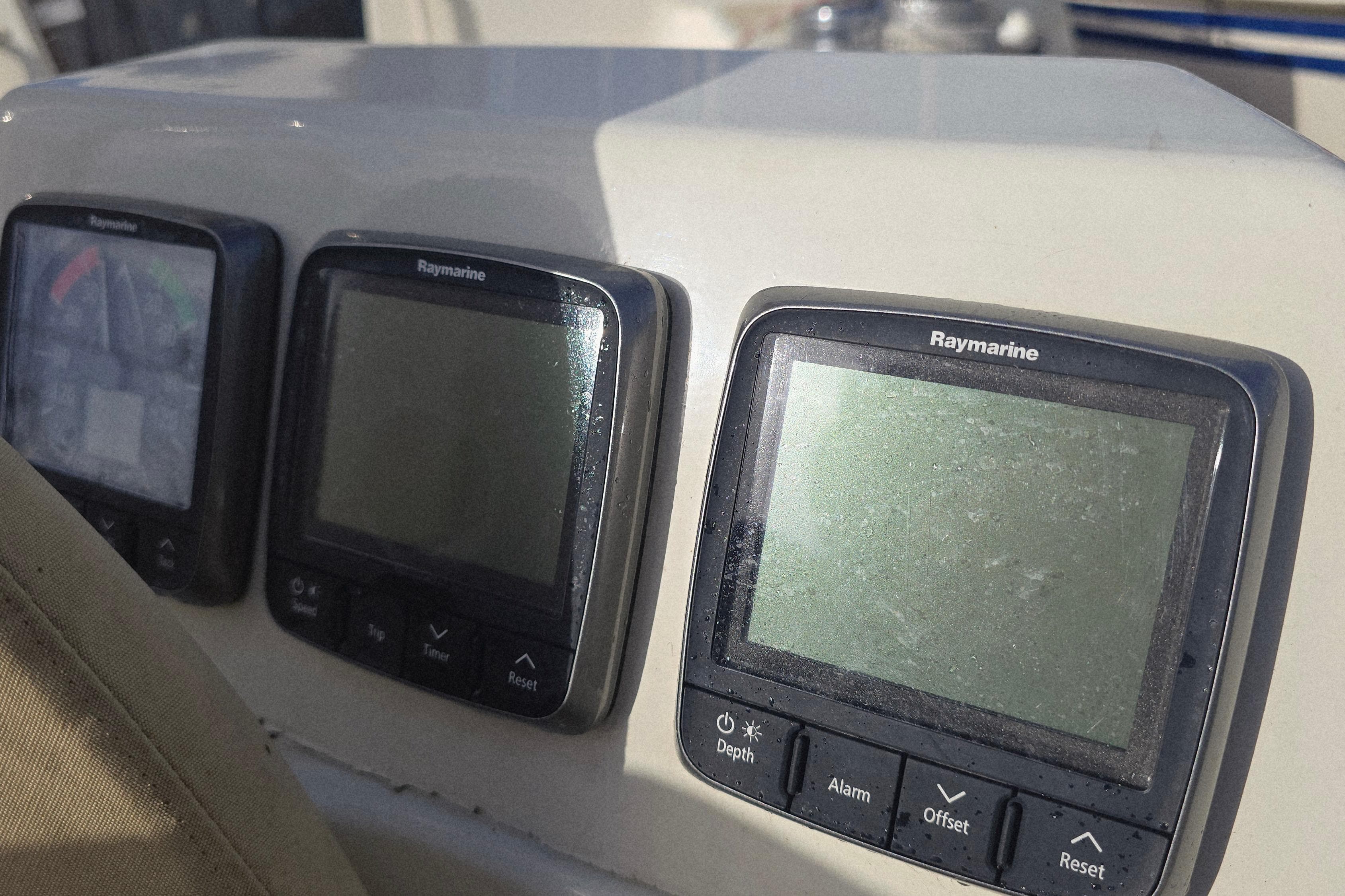 Raymarine navigation instruments on 1965 Van De Stadt Rebel 41 yacht dashboard.