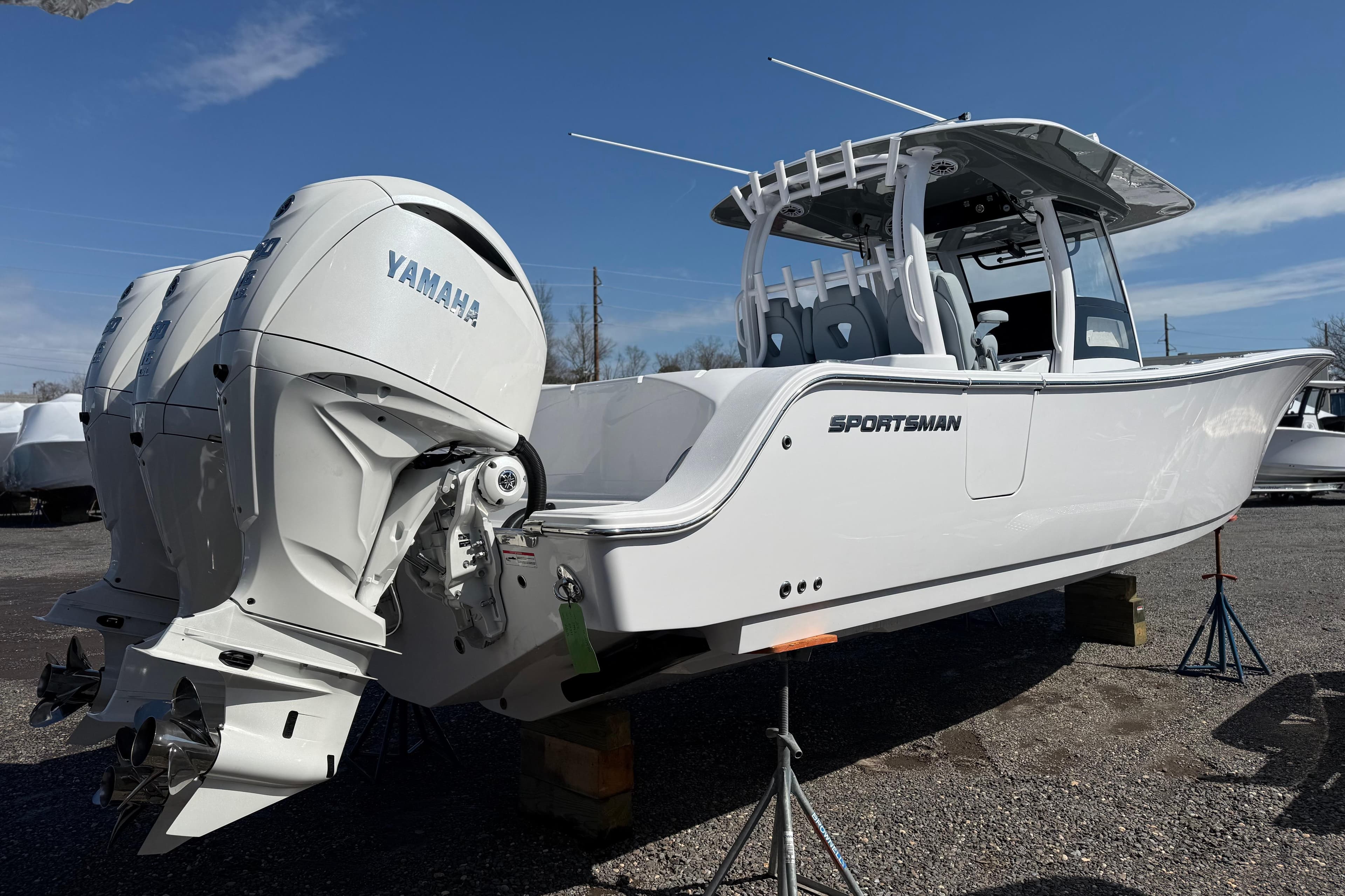 2026 Sportsman Open 352 Center Console boat with Yamaha engines on display.