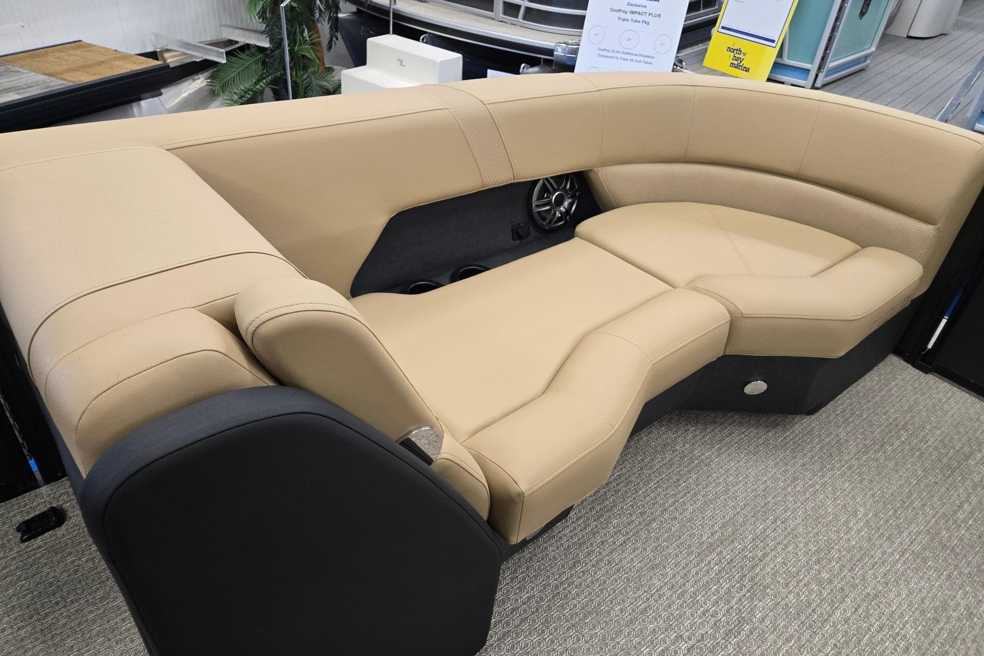 Luxurious beige seating in a 2026 Evotti 521QL boat interior.