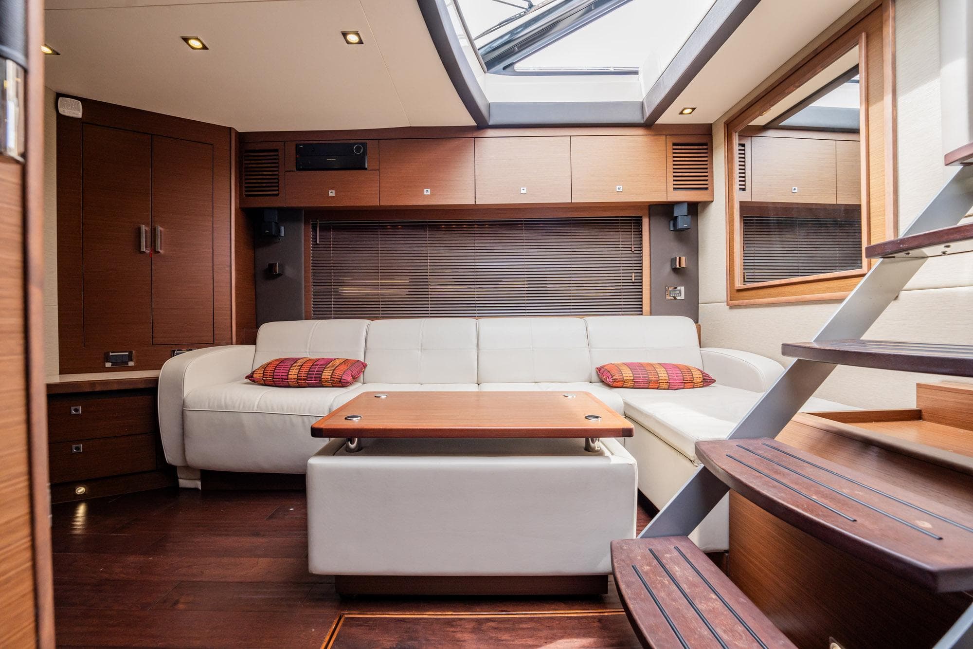 Luxurious interior of 2015 Sea Ray 510 Sundancer yacht with modern furnishings.