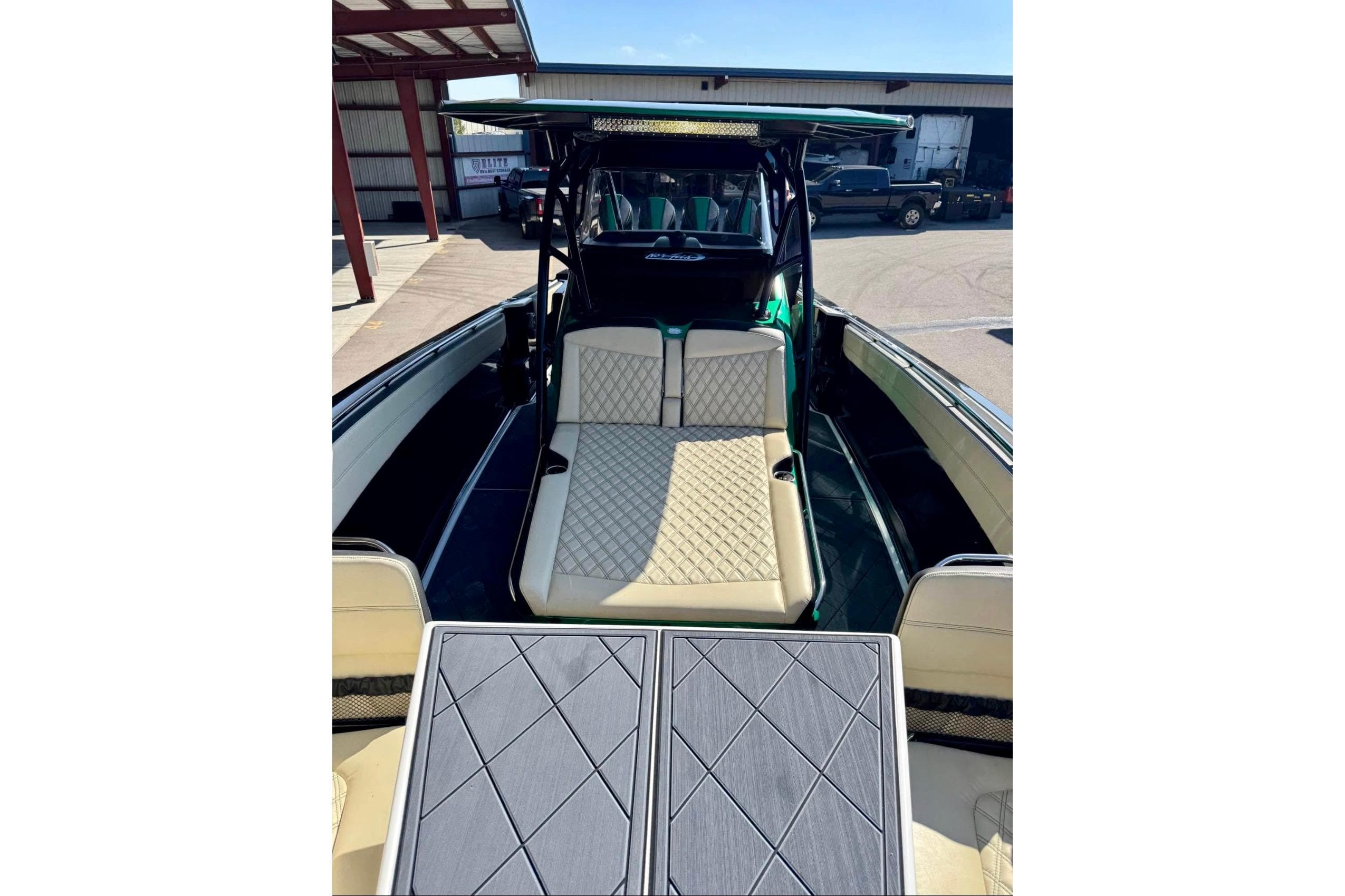 2020 Nor-Tech 390 Sport Center Console boat with luxurious seating and sleek design.