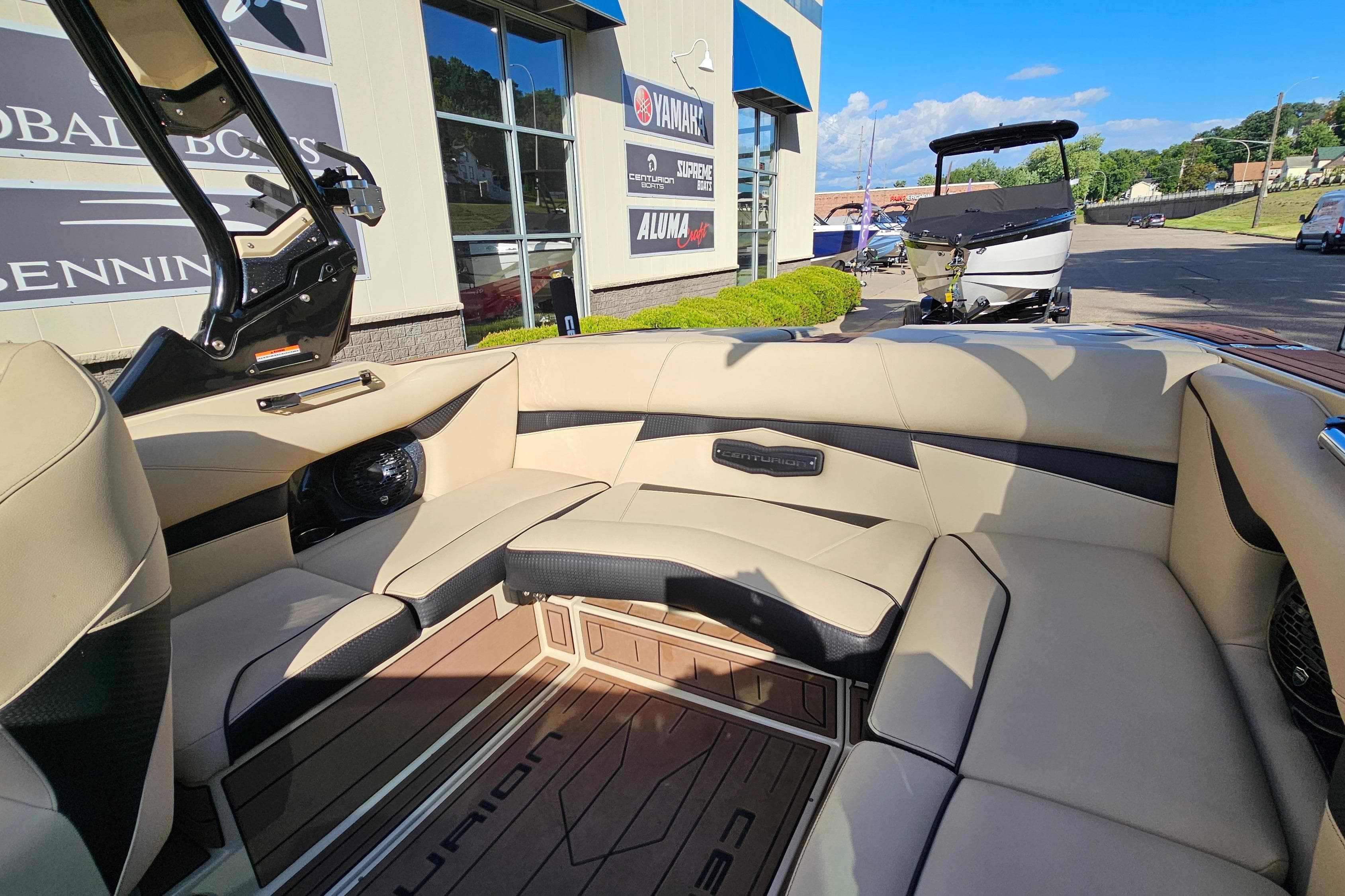 Interior of a 2021 Centurion Fi21 boat with beige seating and modern design.