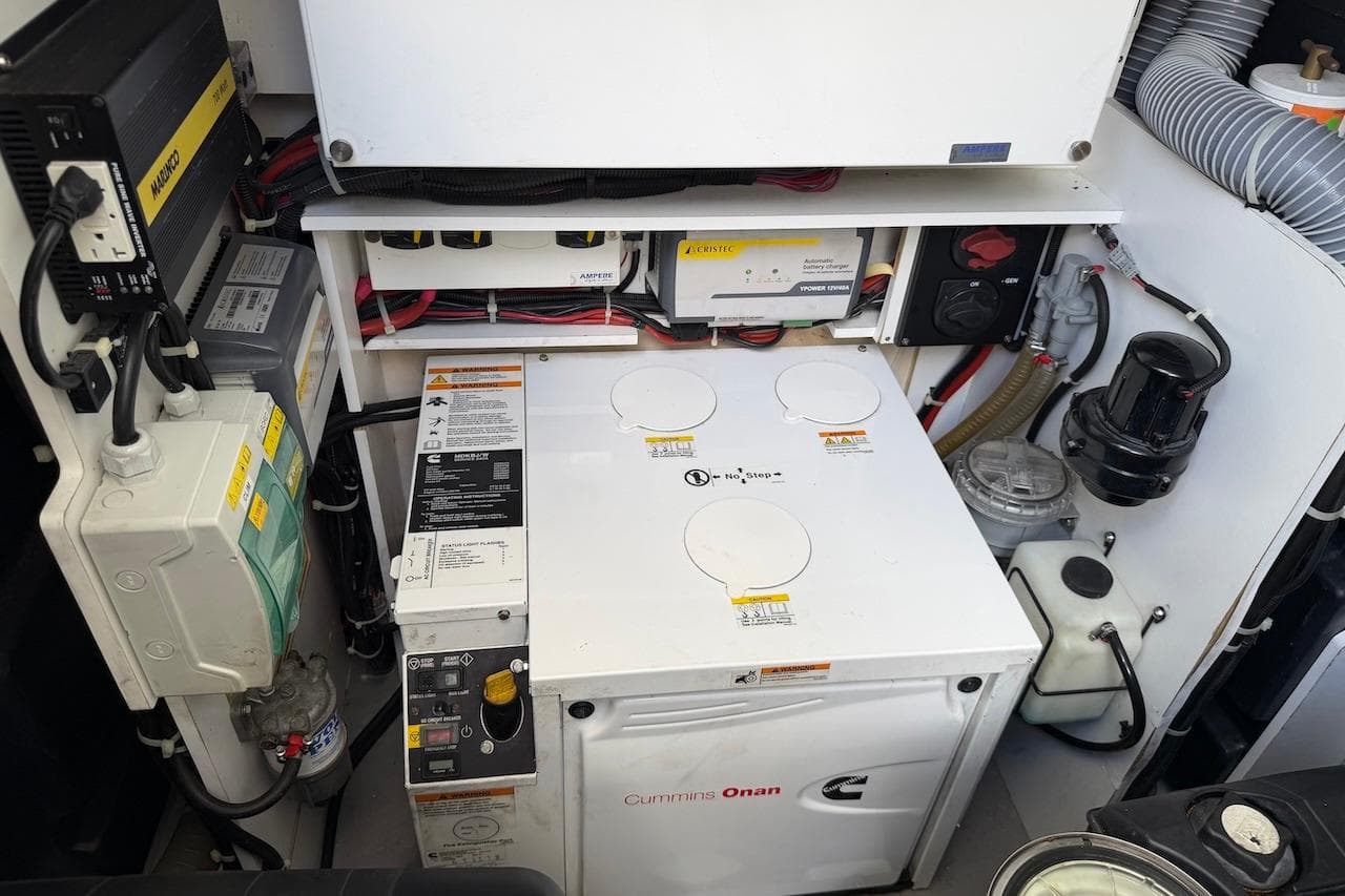 Engine room of 2018 Beneteau Gran Turismo 46 with Cummins Onan generator and electrical components.
