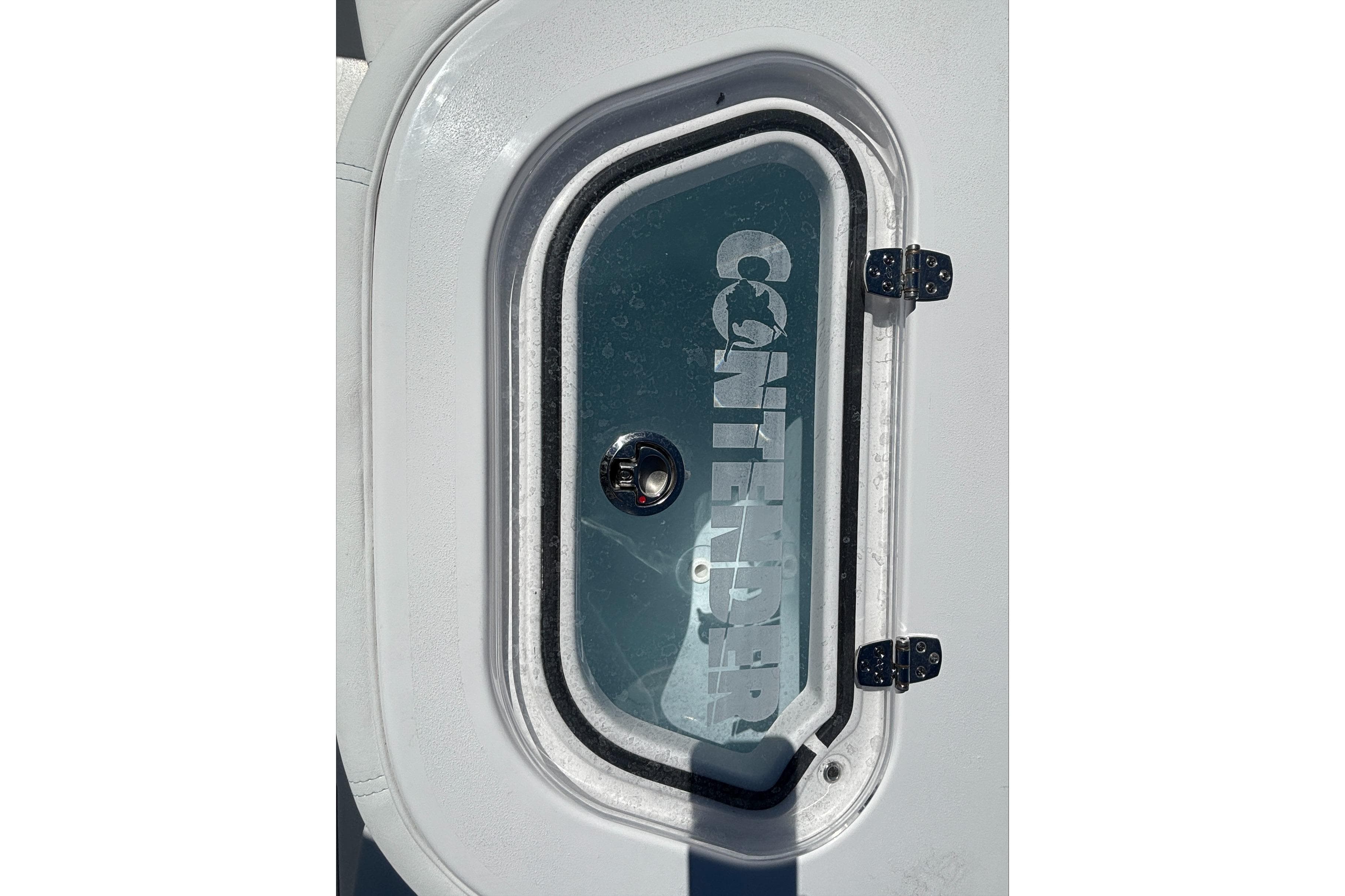 Hatch of 2026 Contender 24 Sport boat with logo visible.
