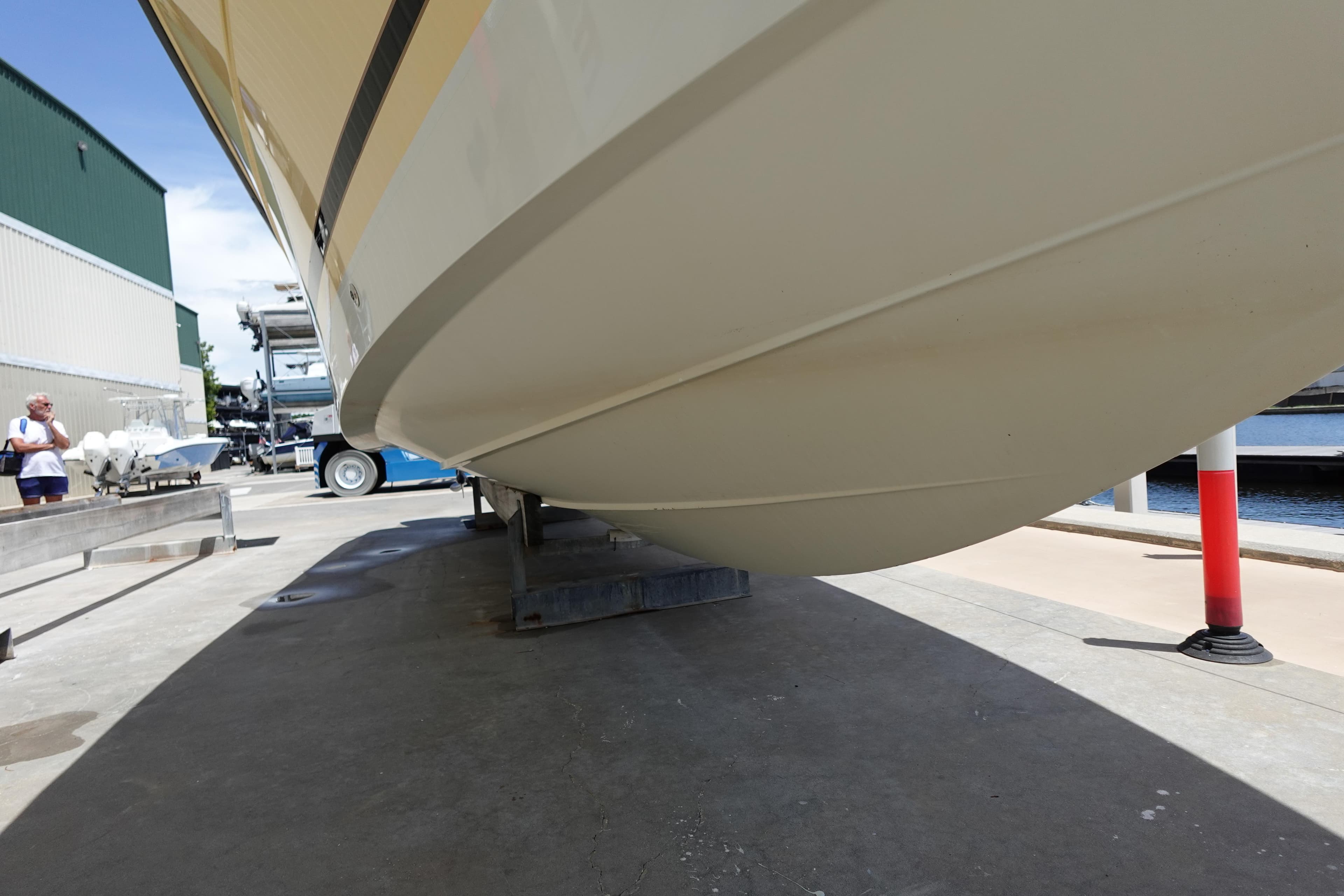 2005 Hydra-Sports Vector 3300 CC boat hull on a trailer at a marina.