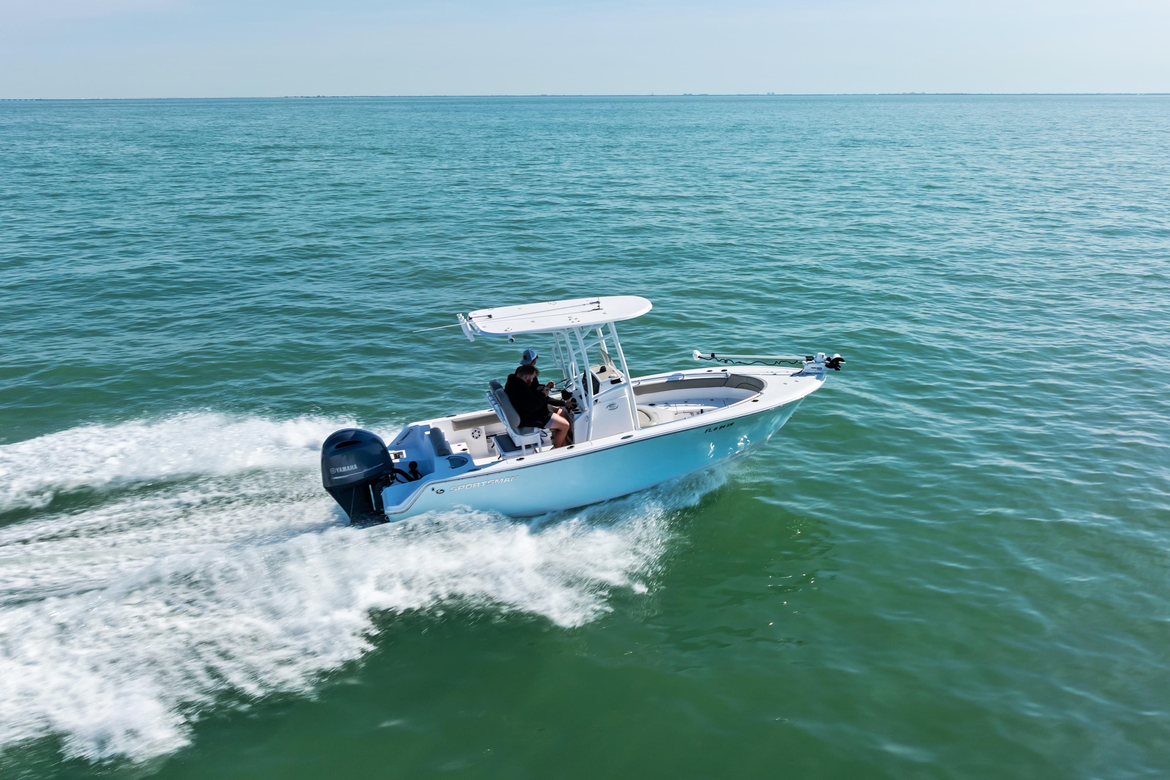 2021 Sportsman Open 212 Center Console boat cruising on open water.