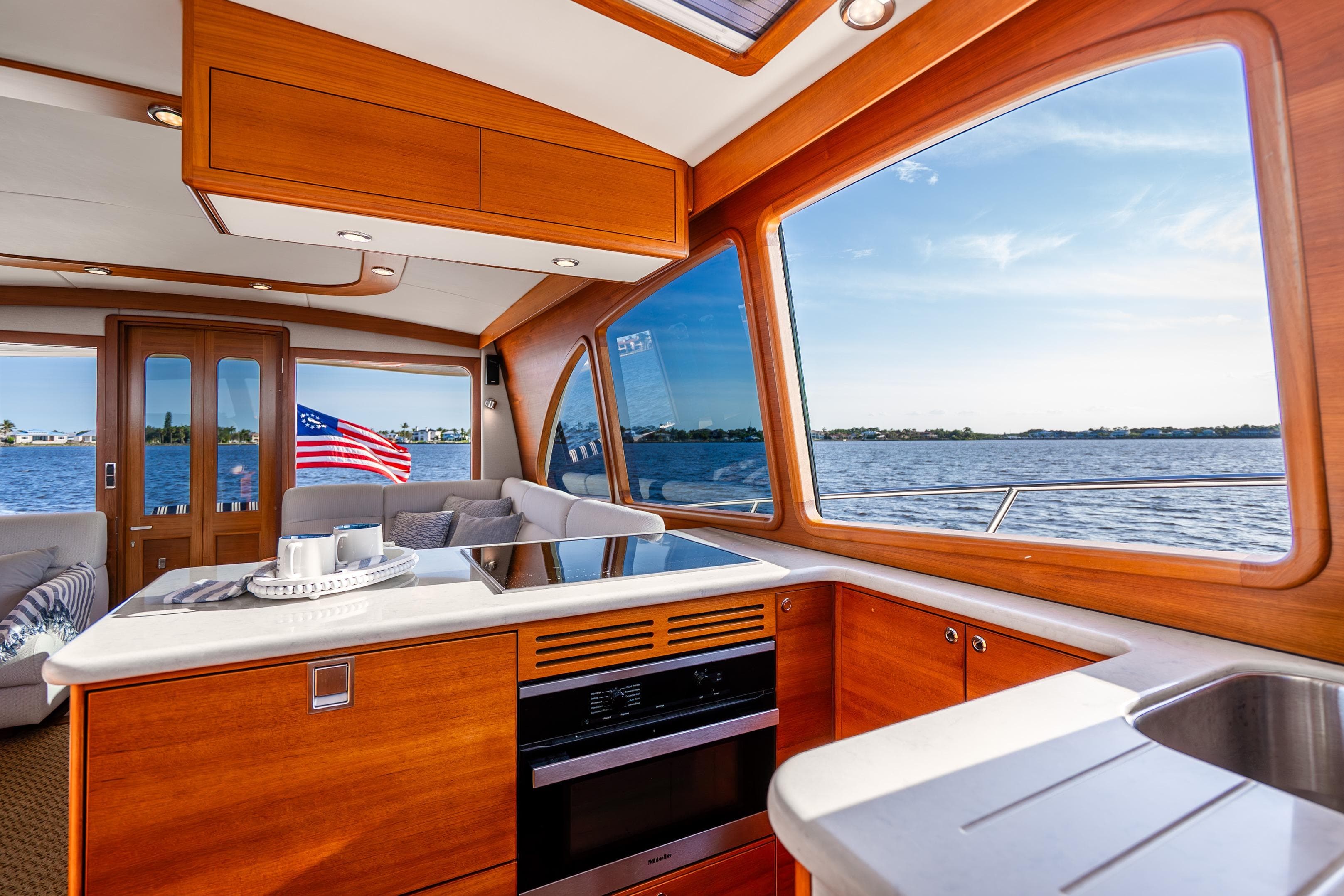 Luxurious interior of 2020 Palm Beach Motor Yachts PB55 with scenic ocean view.