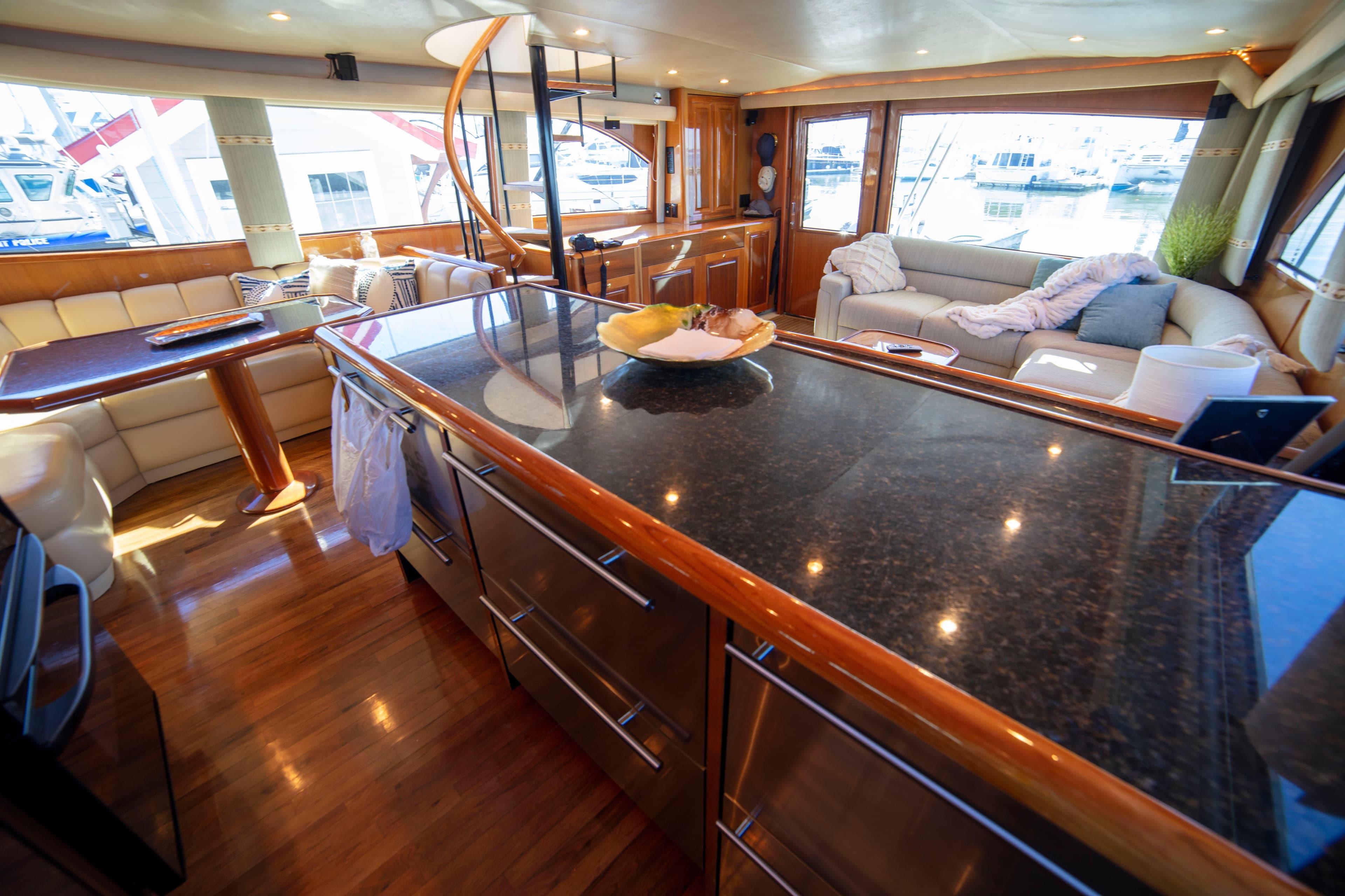 Luxurious interior of 2002 Viking 65 Enclosed Bridge yacht with modern furnishings.