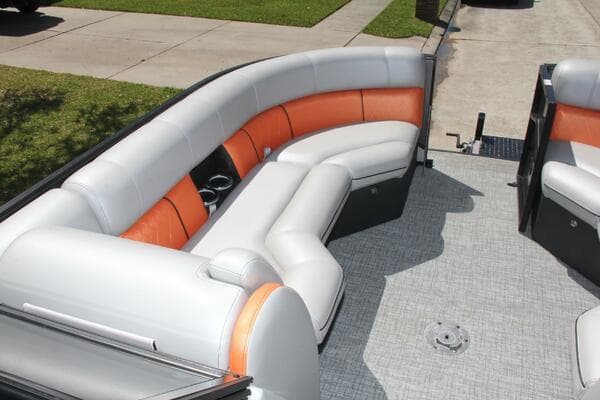 2021 Berkshire 25 Sport CL boat interior with orange and white seating.