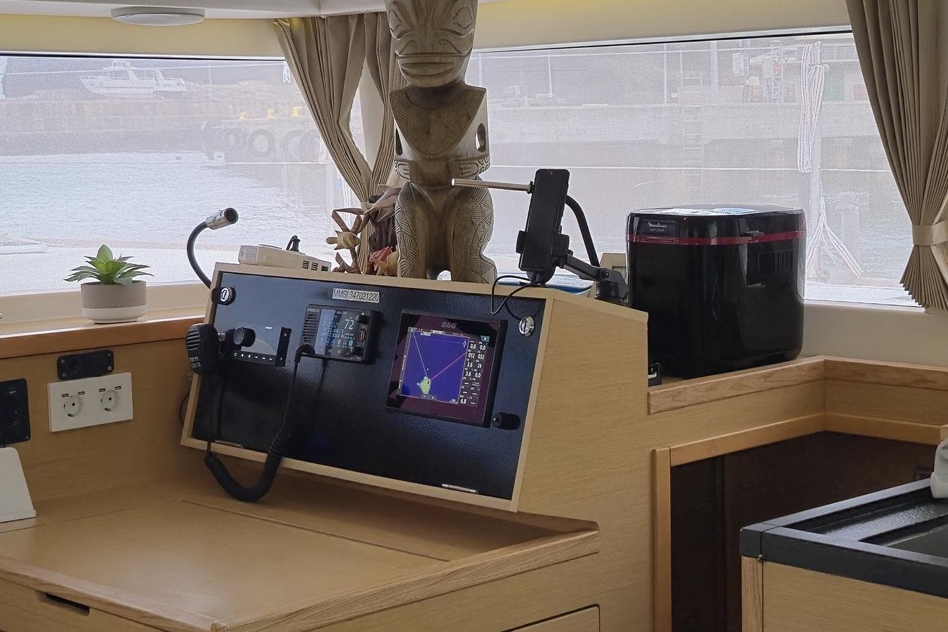 Interior of 2017 Lagoon 400 S2 yacht with navigation equipment and decor.