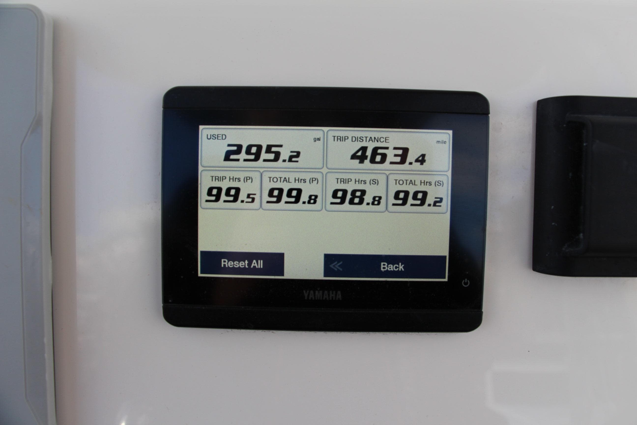 Yamaha display on 2024 Key West 244 Center Console showing trip data and fuel usage.