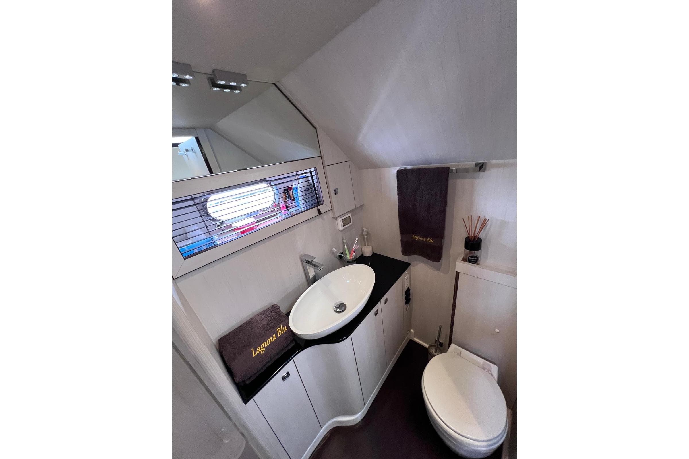 Bathroom interior of 2014 Solemar 44.1 Oceanic yacht, featuring modern sink and toilet.