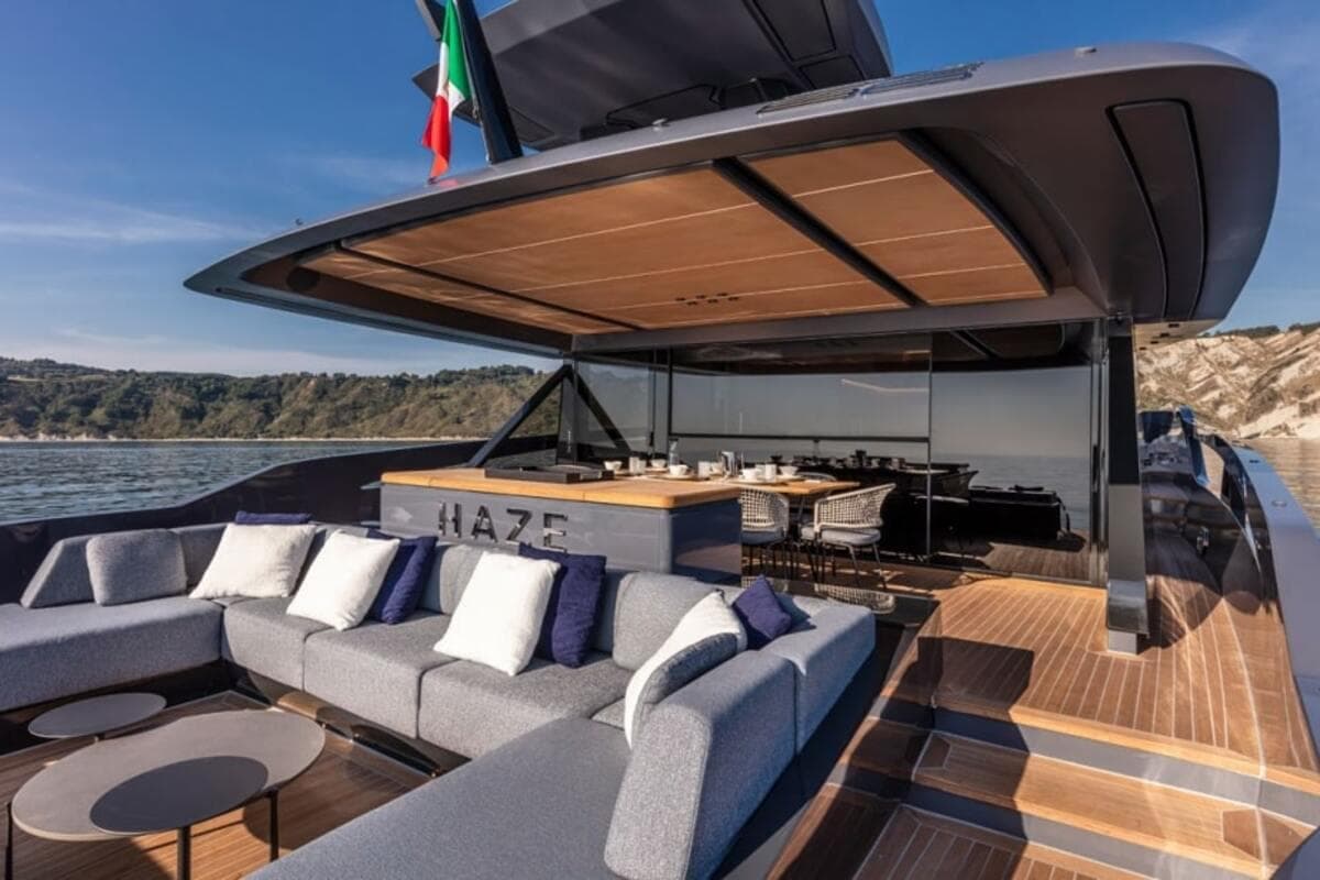 Luxurious Palumbo Extra 86 yacht, 2021 model, featuring elegant outdoor seating and dining area.
