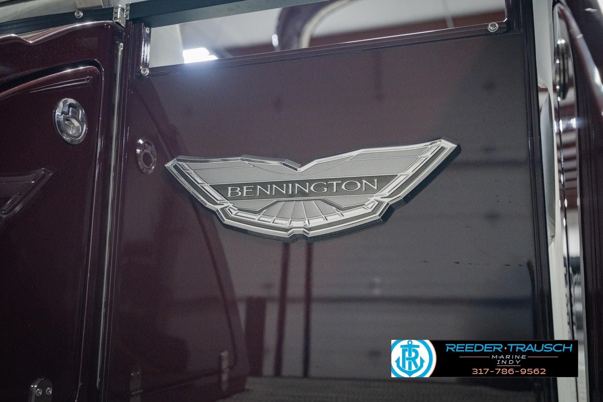 2022 Bennington 23 QXFBA boat emblem with Reeder-Trausch Marine logo.