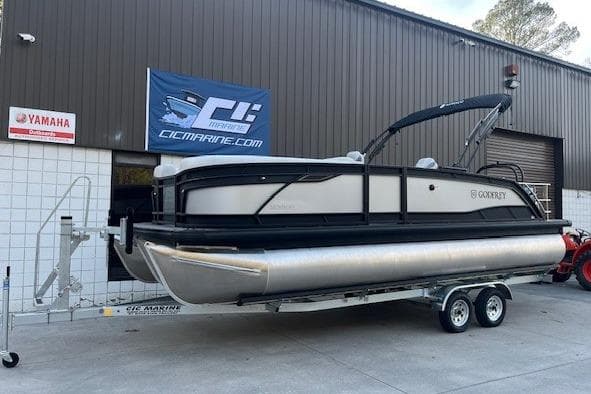 2026 Godfrey Monaco 235 SFLC on trailer outside warehouse.