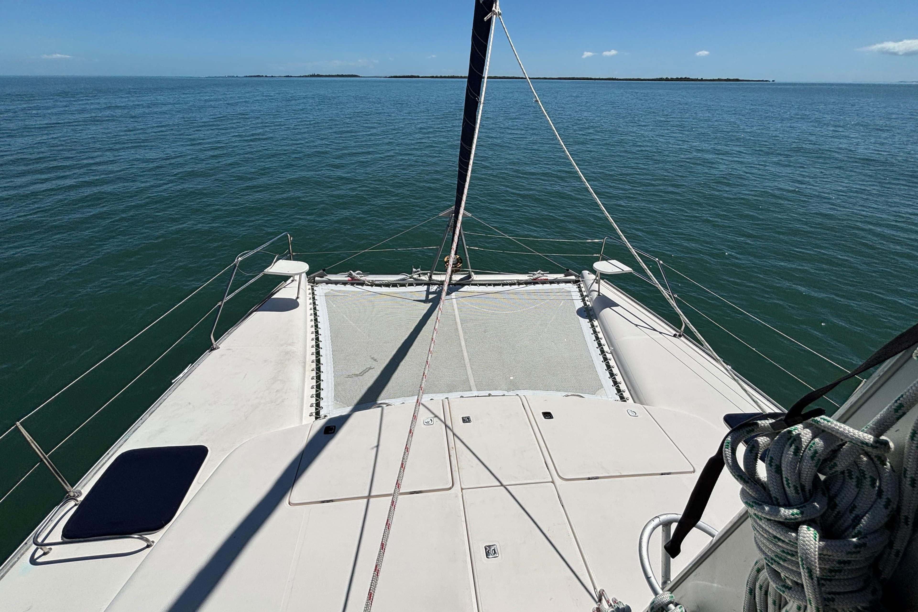 2007 Leopard 40 catamaran deck view on calm ocean waters.