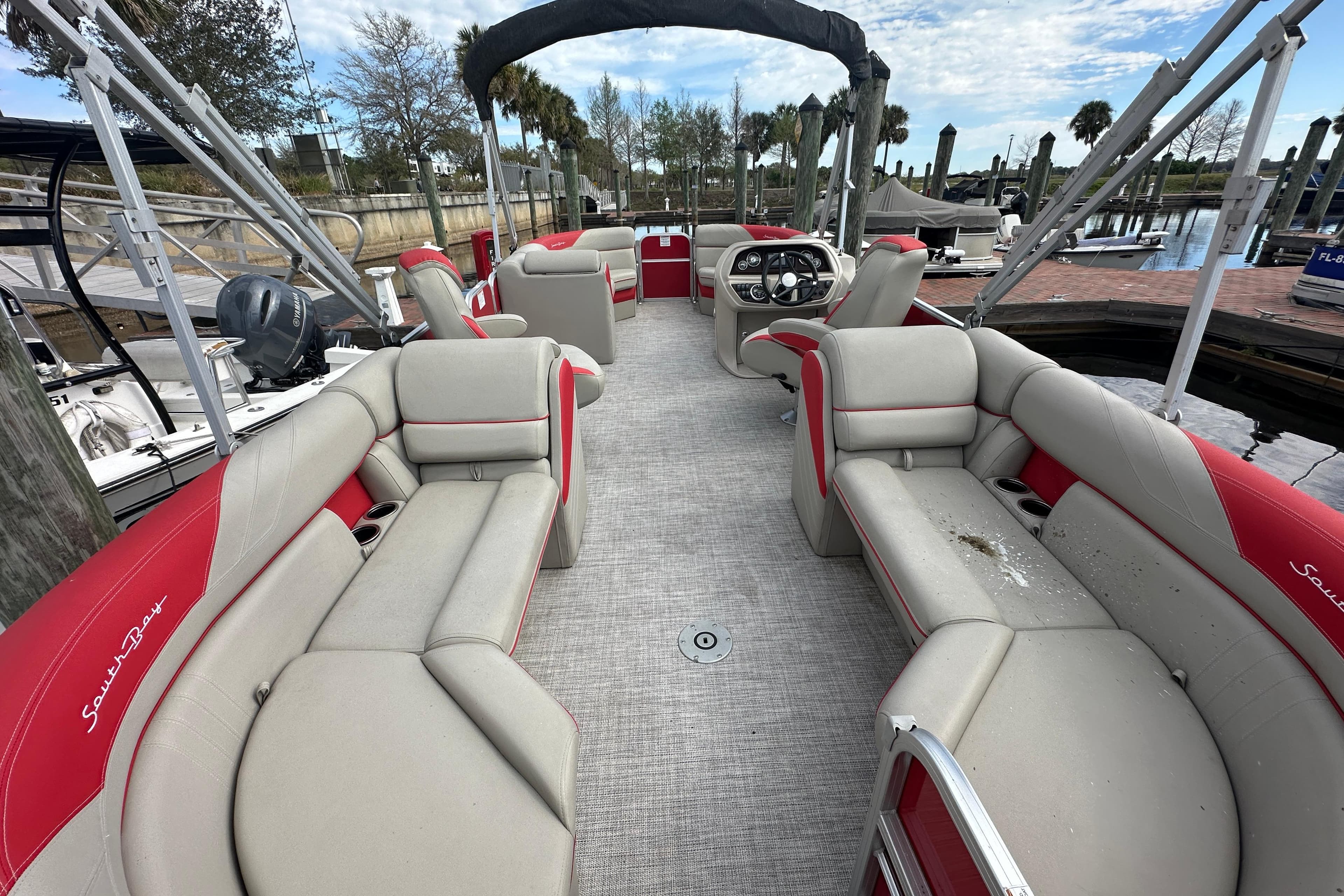 2022 South Bay Pontoons 24 LE Series Tri Hull with spacious seating and modern design.
