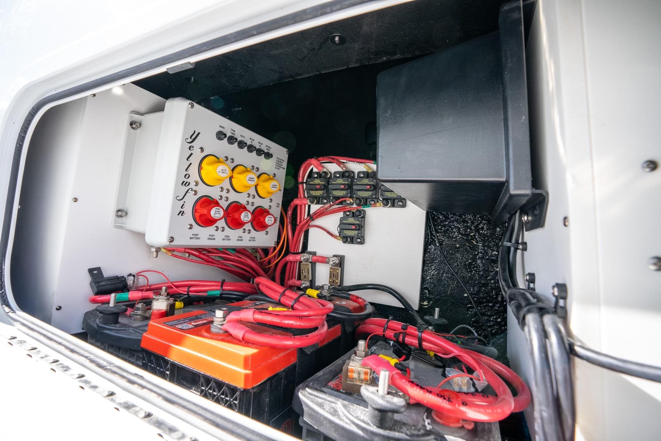 Electrical system of a 2025 Yellowfin 32 boat with batteries and wiring.