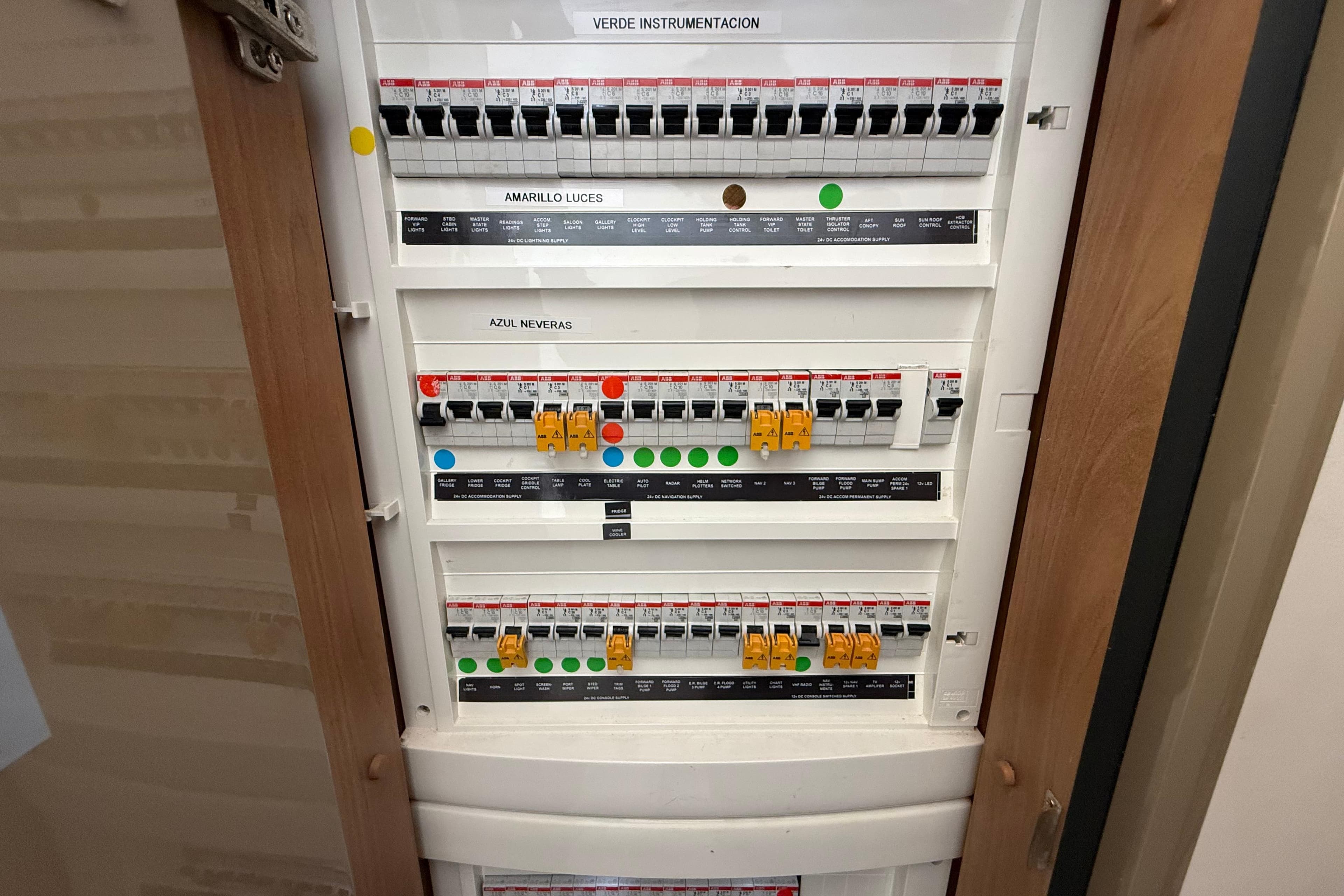 Electrical panel inside a 2012 Sunseeker Predator 60 yacht, showing labeled circuit breakers.