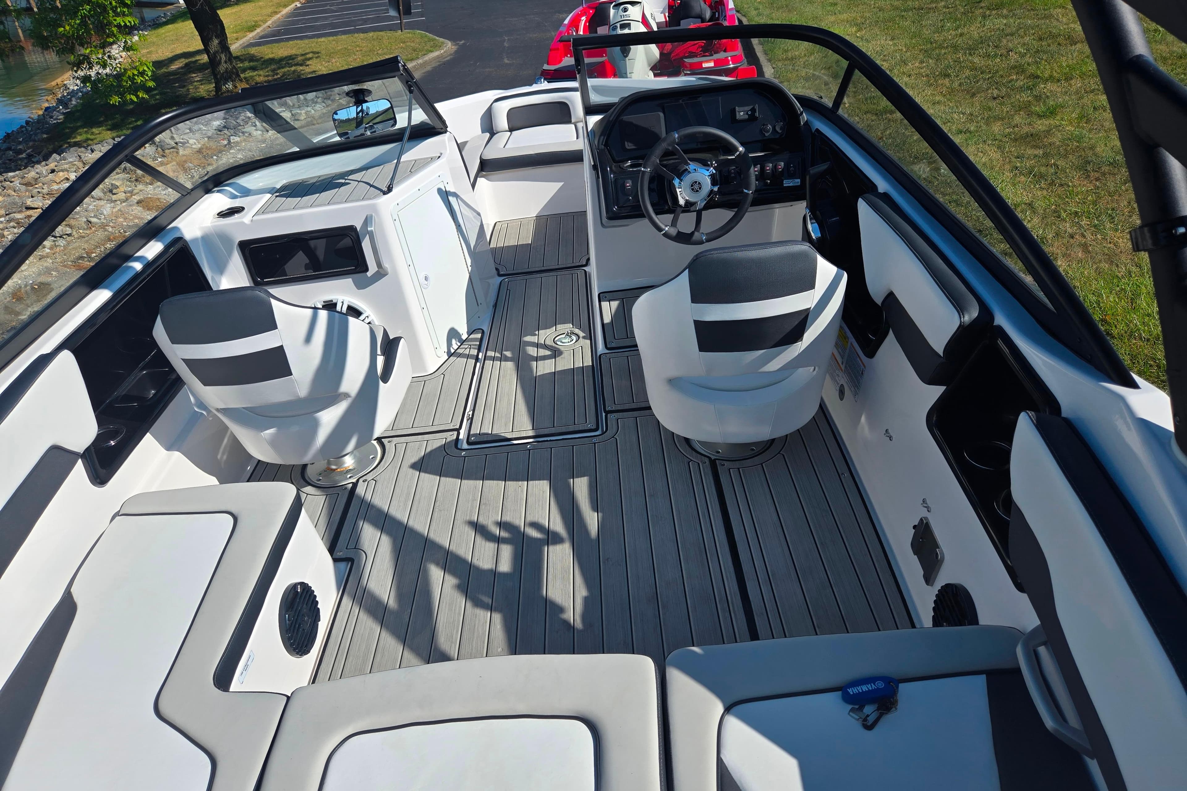2024 Yamaha Boats 195S interior with sleek seating and modern dashboard design.
