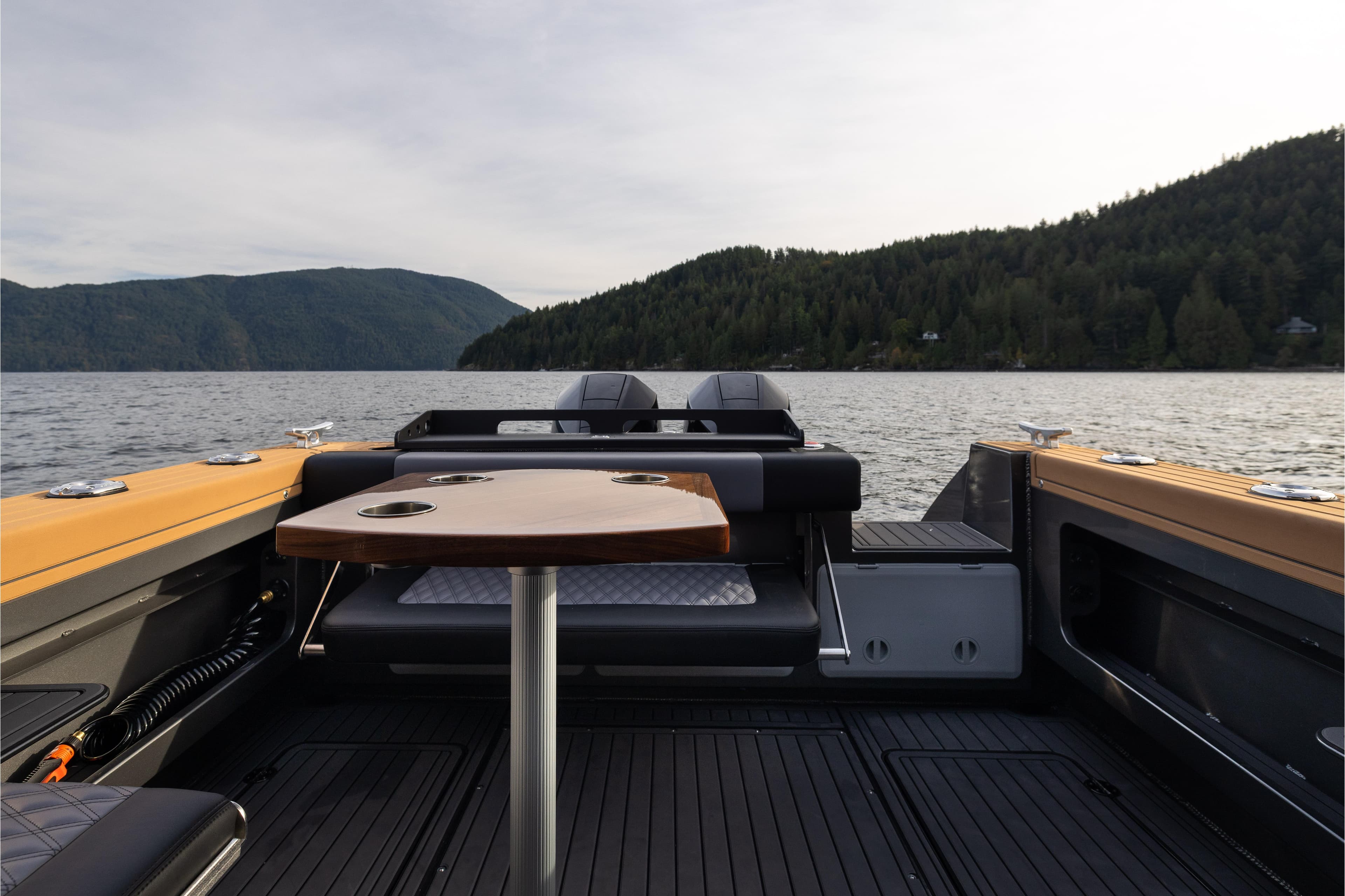 2026 Jasper Marine Defender 22 boat interior with scenic lake and mountain view.