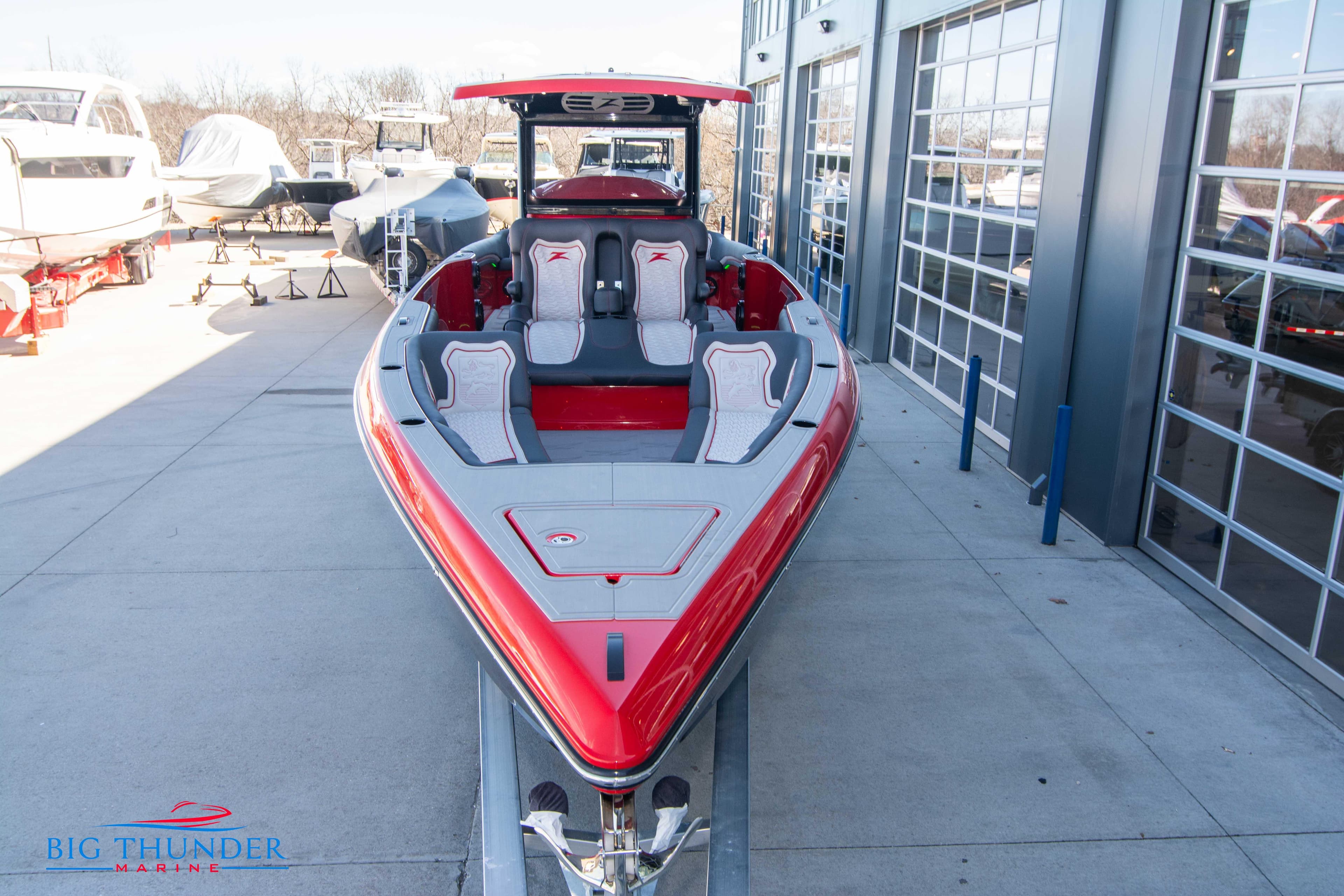 2024 Donzi 39 VRZ speedboat in red and gray at Big Thunder Marine.