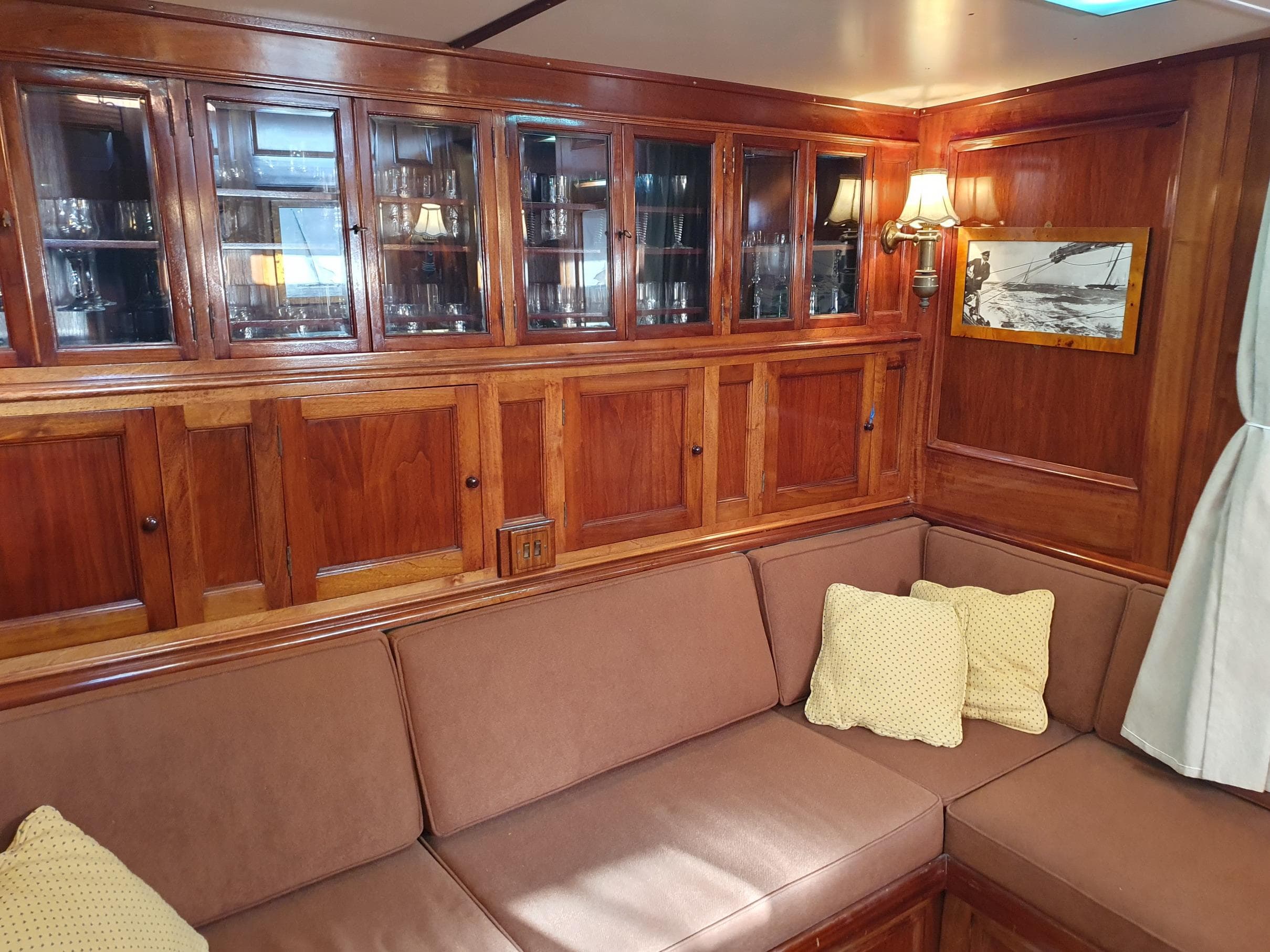 Luxurious wooden interior of 1933 Camper & Nicholsons Classic 114FT Ketch yacht.