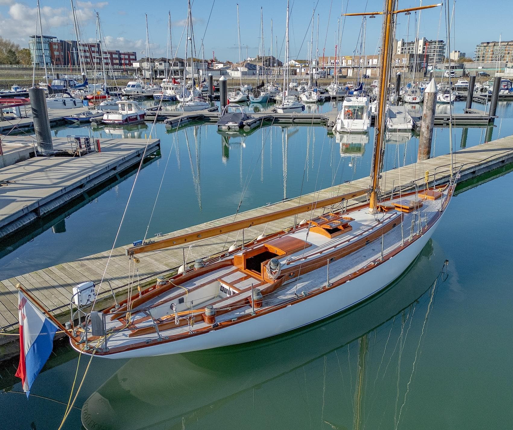 Classic 2009 Sparkman & Stephens New York 32 yacht docked in a marina.