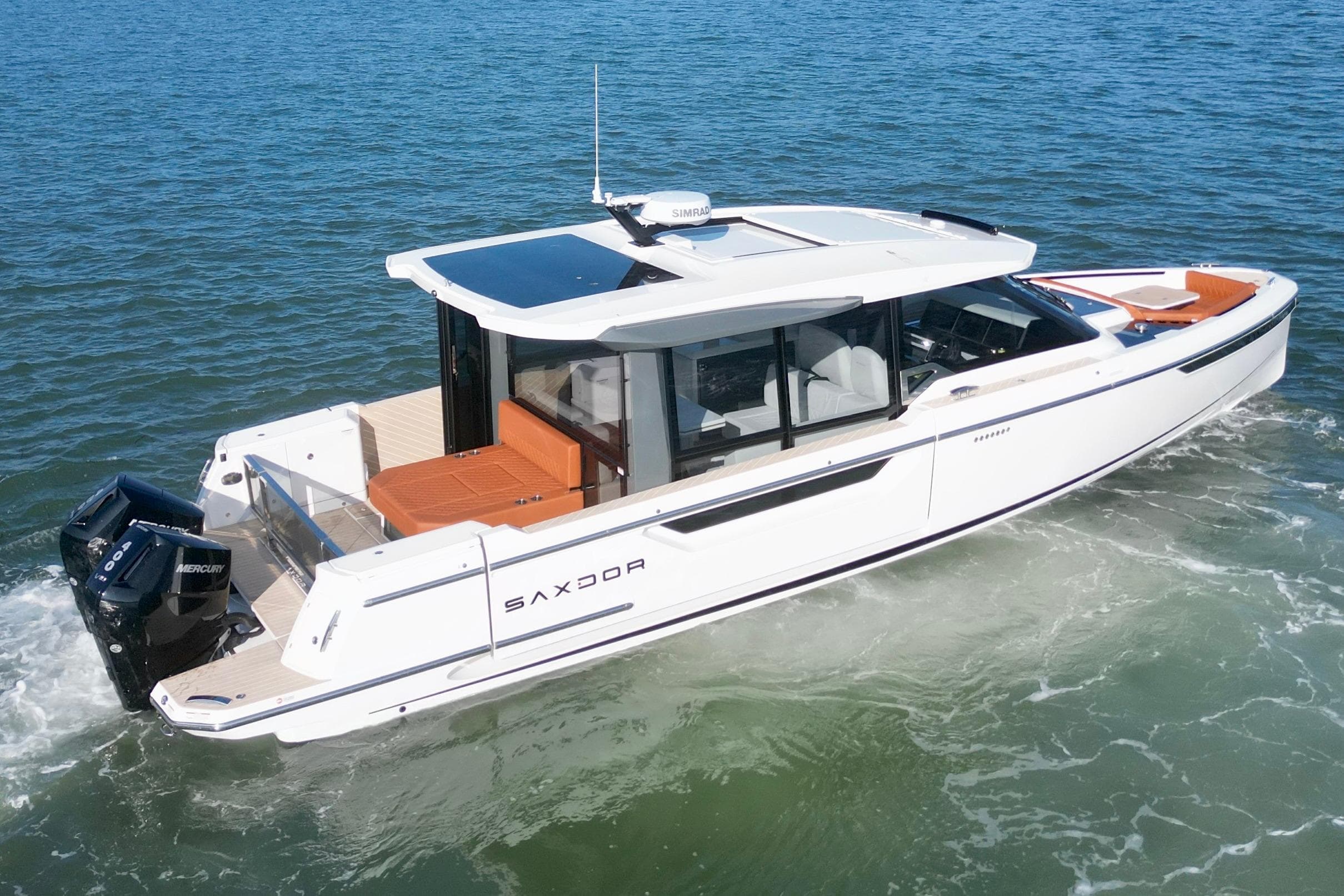 2026 Saxdor 400 GTC luxury motorboat cruising on open water.