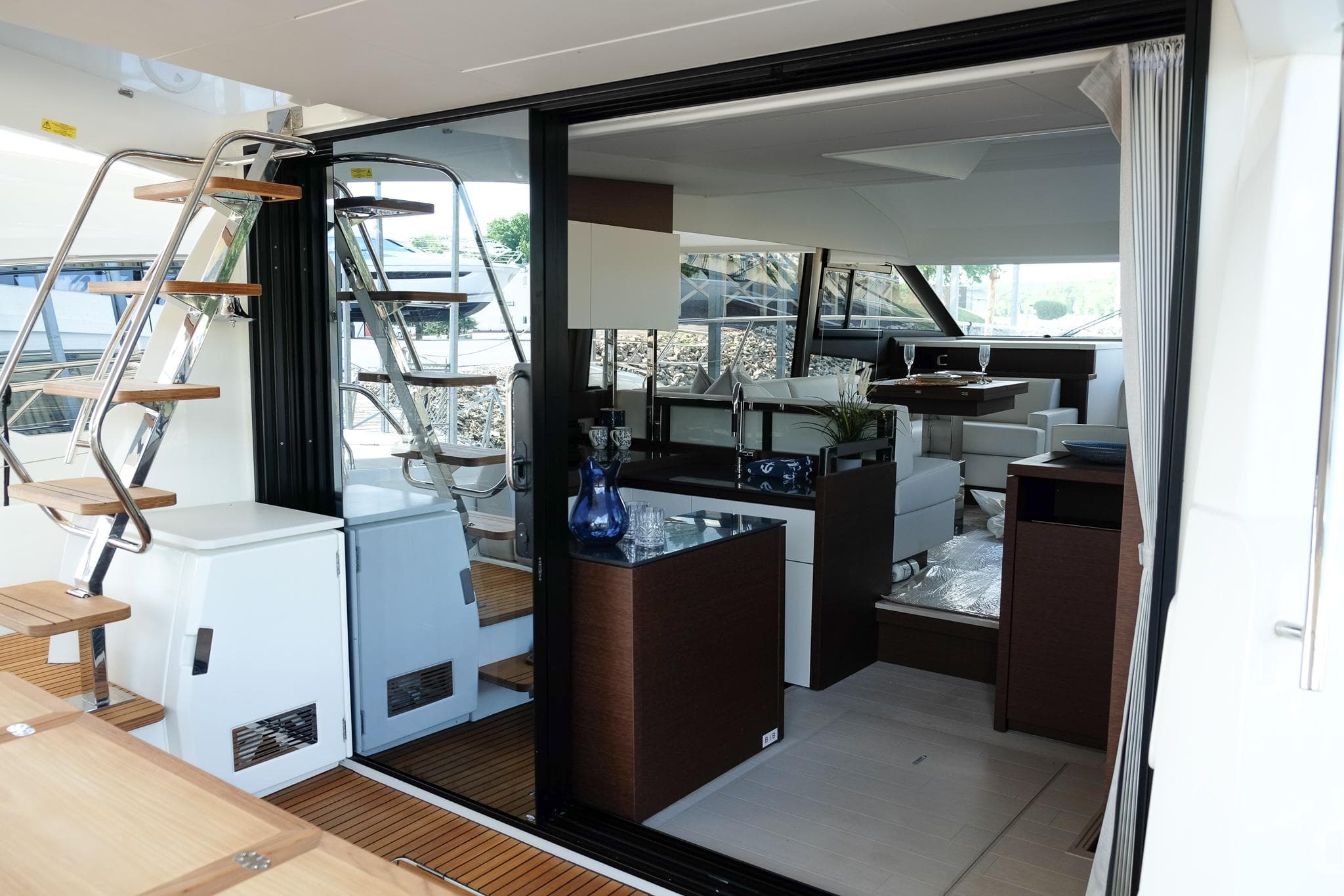 Luxurious interior of 2024 Prestige 520 Flybridge yacht with modern design and elegant furnishings.