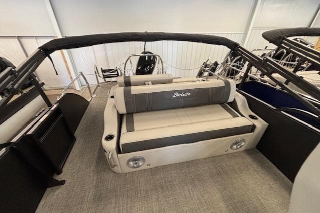 2026 Barletta Corsa 23UC pontoon boat interior with cushioned seating and sleek design.